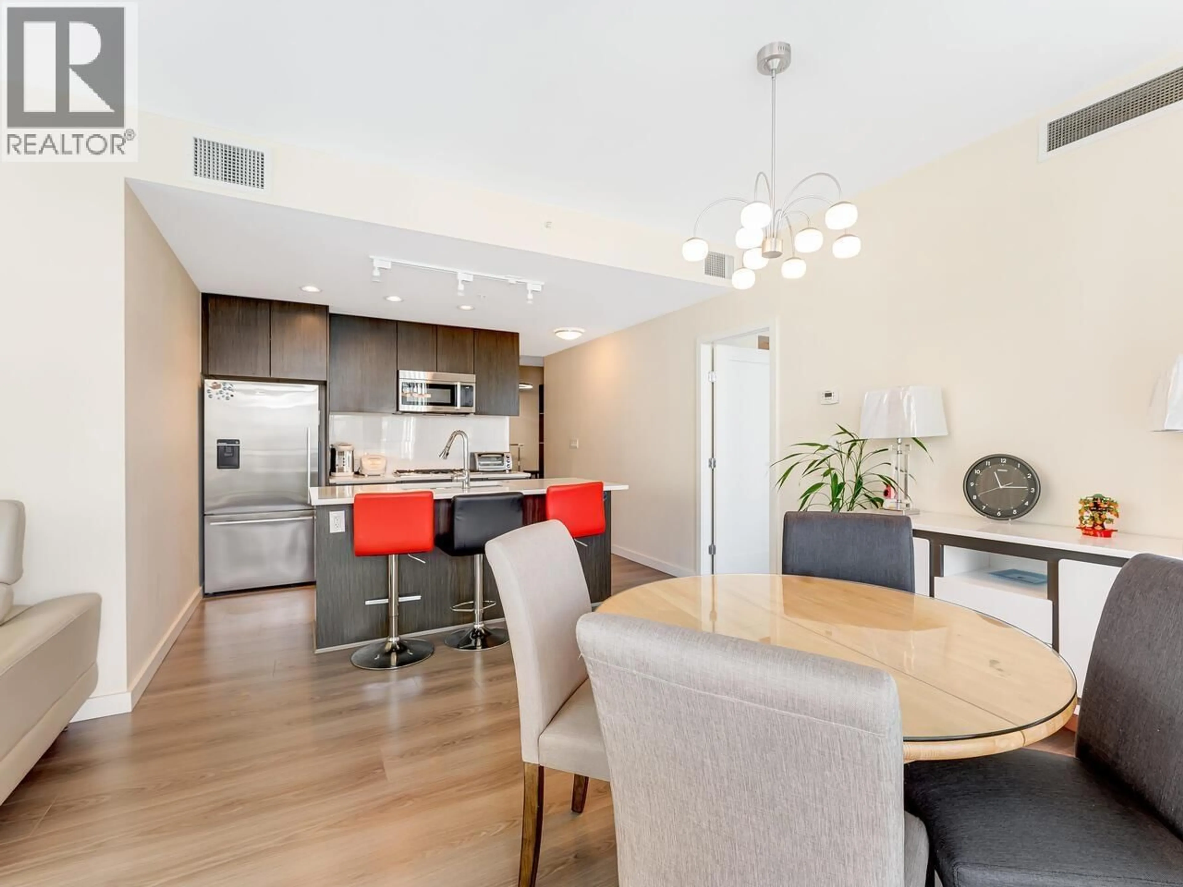 Open concept kitchen, wood/laminate floor for 802 - 8677 CAPSTAN WAY, Richmond British Columbia V6X0N6