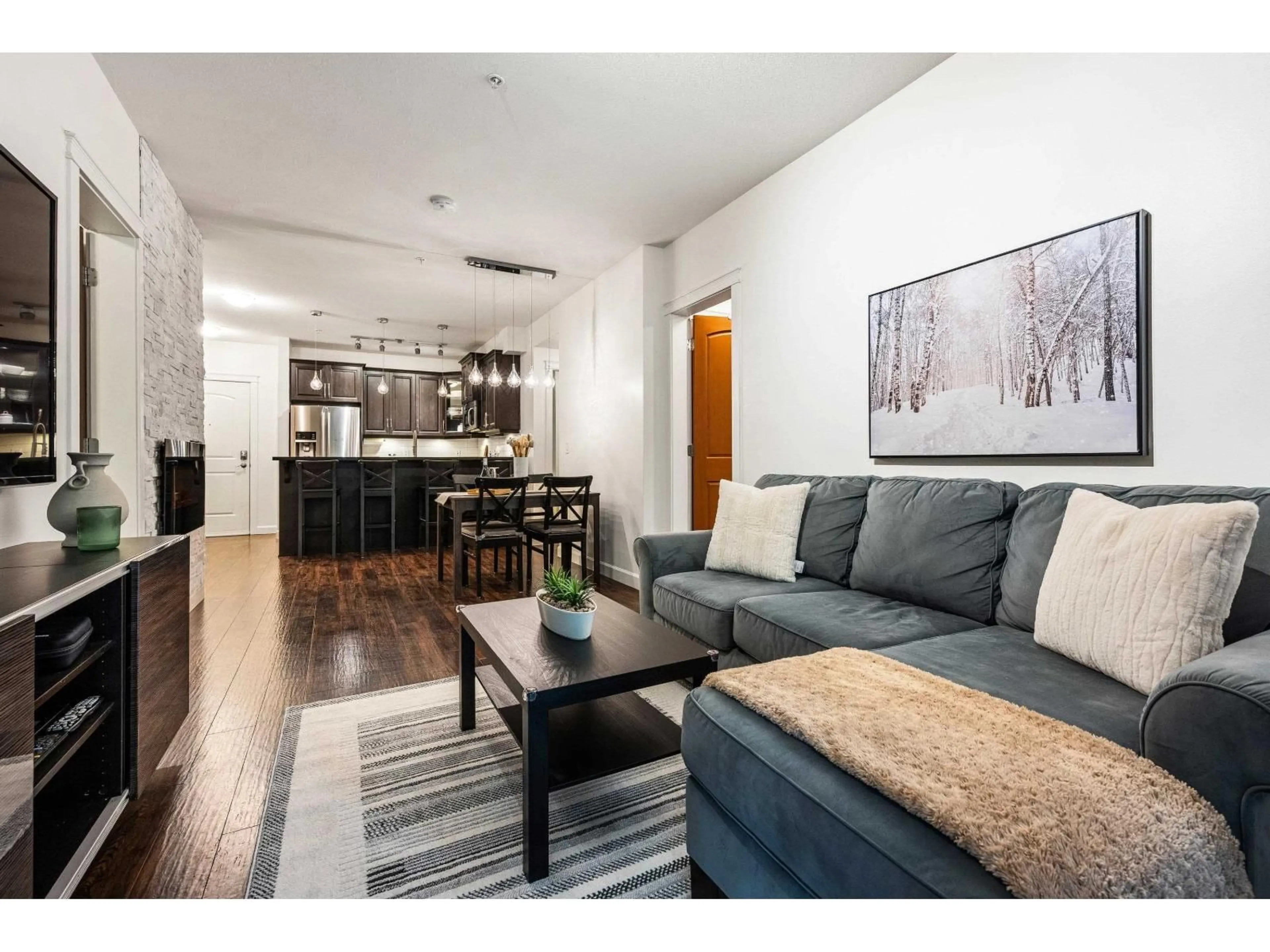 Living room with furniture, wood/laminate floor for 154 - 8328 207A, Langley British Columbia V2Y0K5