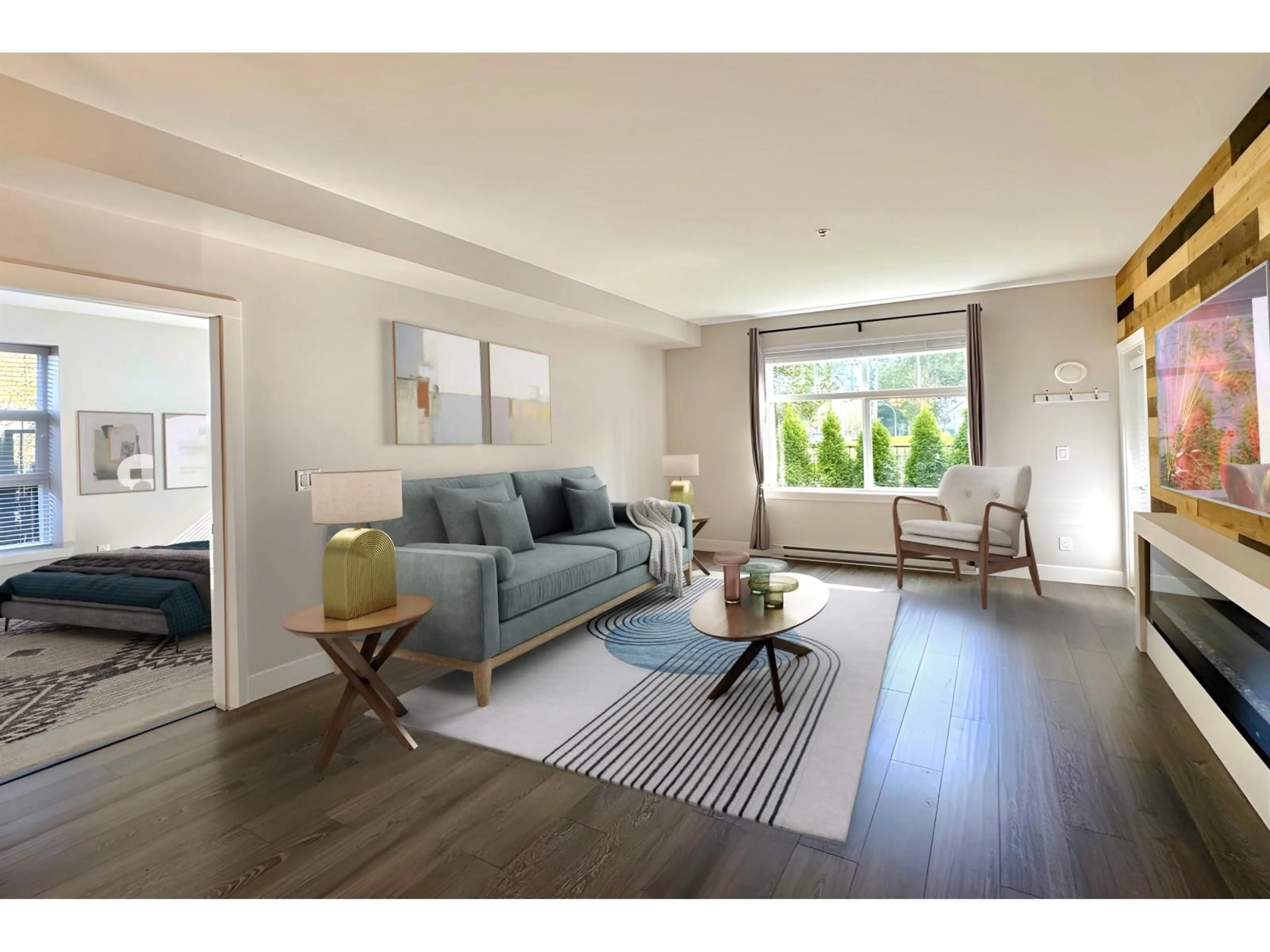 Living room with furniture, wood/laminate floor for 101 - 14605 MCDOUGALL, Surrey British Columbia V4P0G7