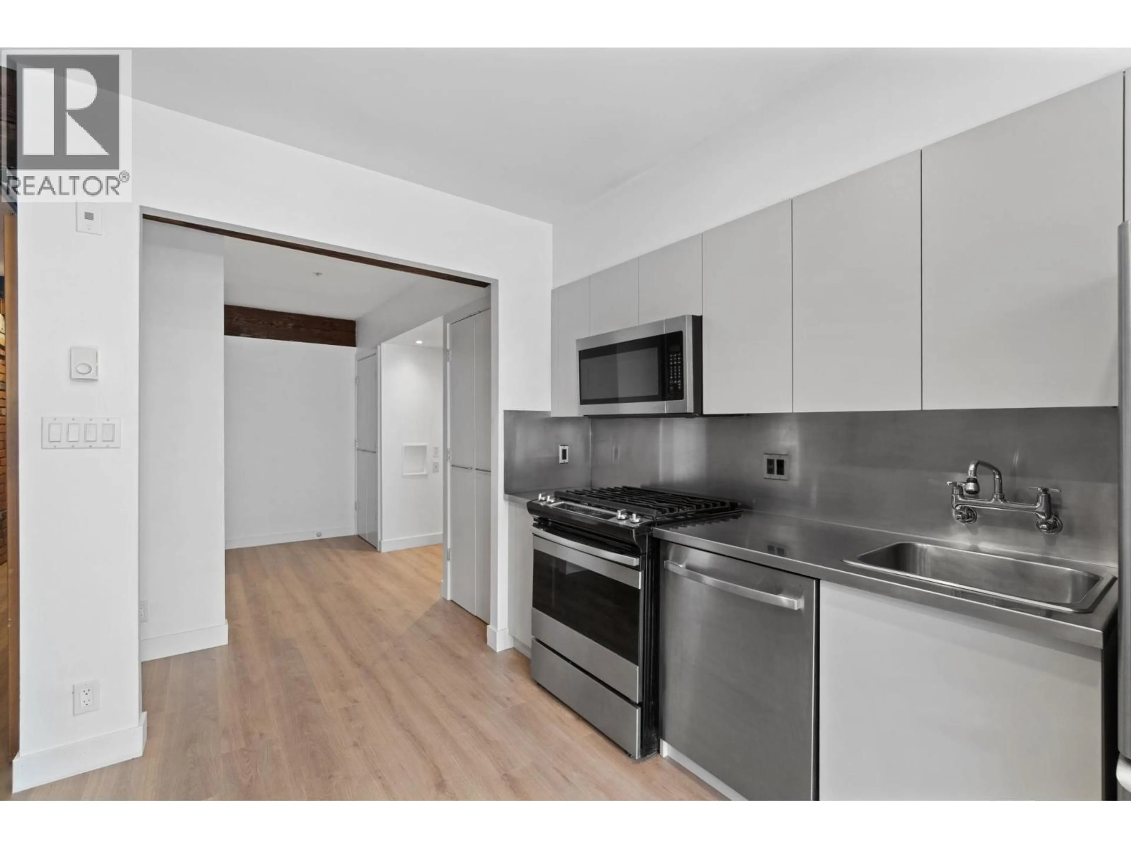 Standard kitchen, wood/laminate floor for 308 - 1072 HAMILTON STREET, Vancouver British Columbia V6B2R9
