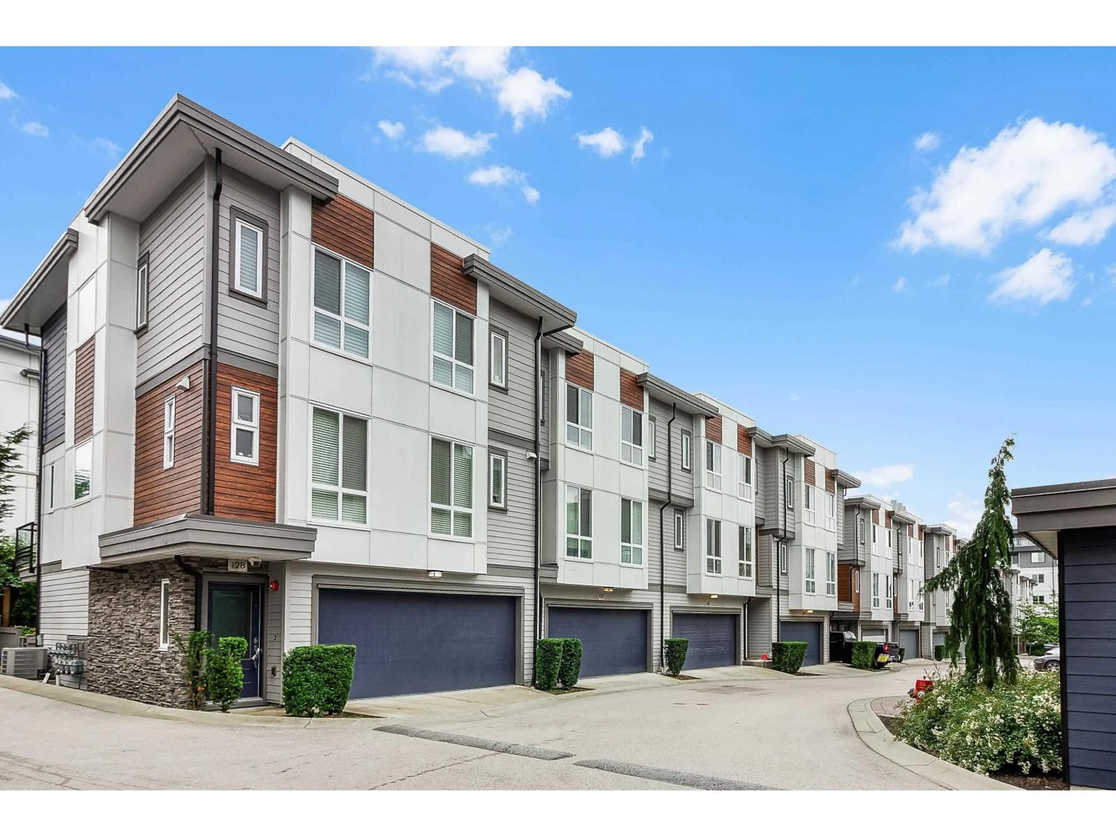 A pic from outside/outdoor area/front of a property/back of a property/a pic from drone, street for 127 - 7947 209, Langley British Columbia V2Y2C8