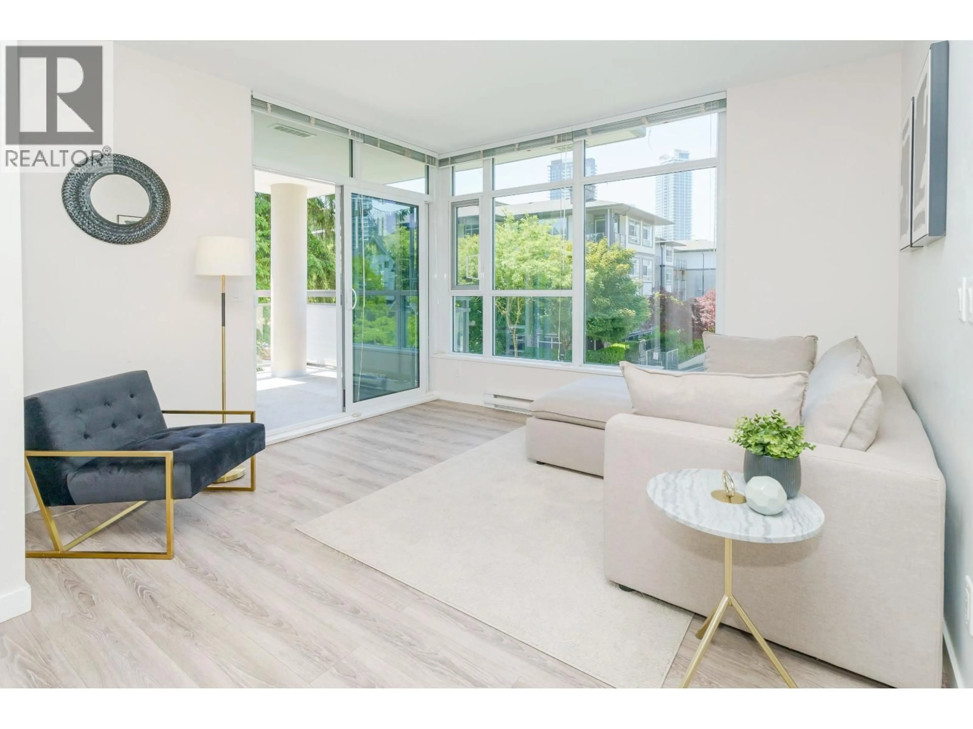 Living room with furniture, unknown for 205 - 711 BRESLAY STREET, Coquitlam British Columbia V3J0G7