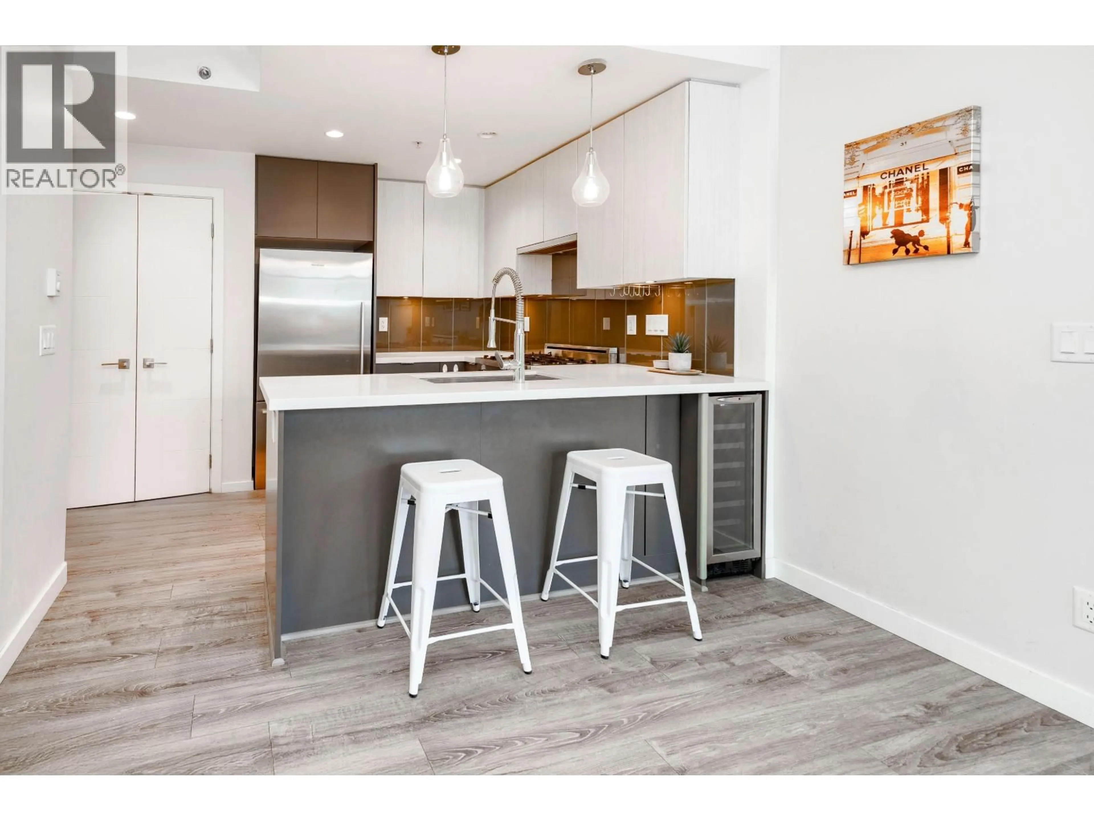 Open concept kitchen, wood/laminate floor for 205 - 711 BRESLAY STREET, Coquitlam British Columbia V3J0G7
