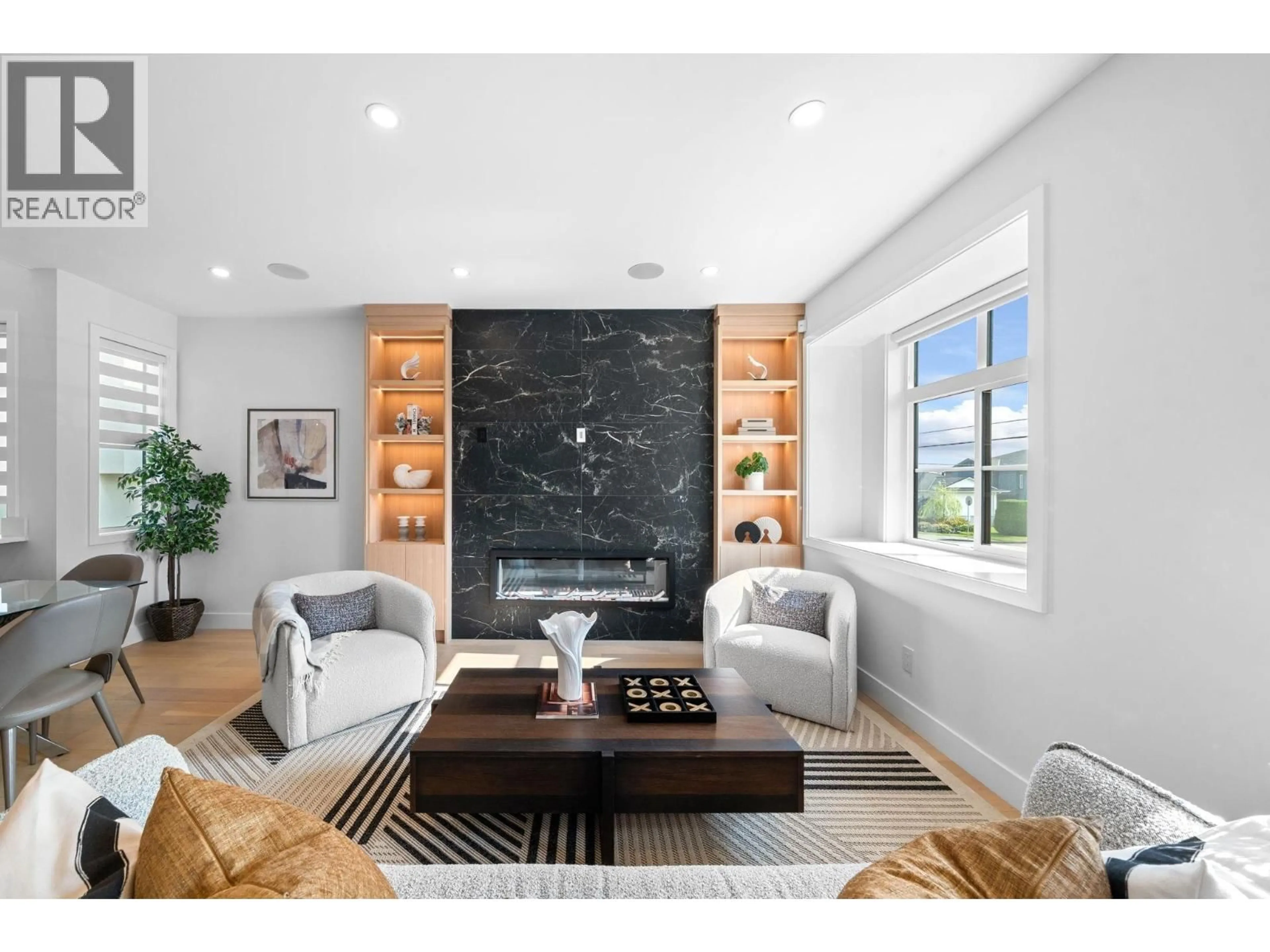 Living room with furniture, ceramic/tile floor for 7588 2ND STREET, Burnaby British Columbia V3N3R6