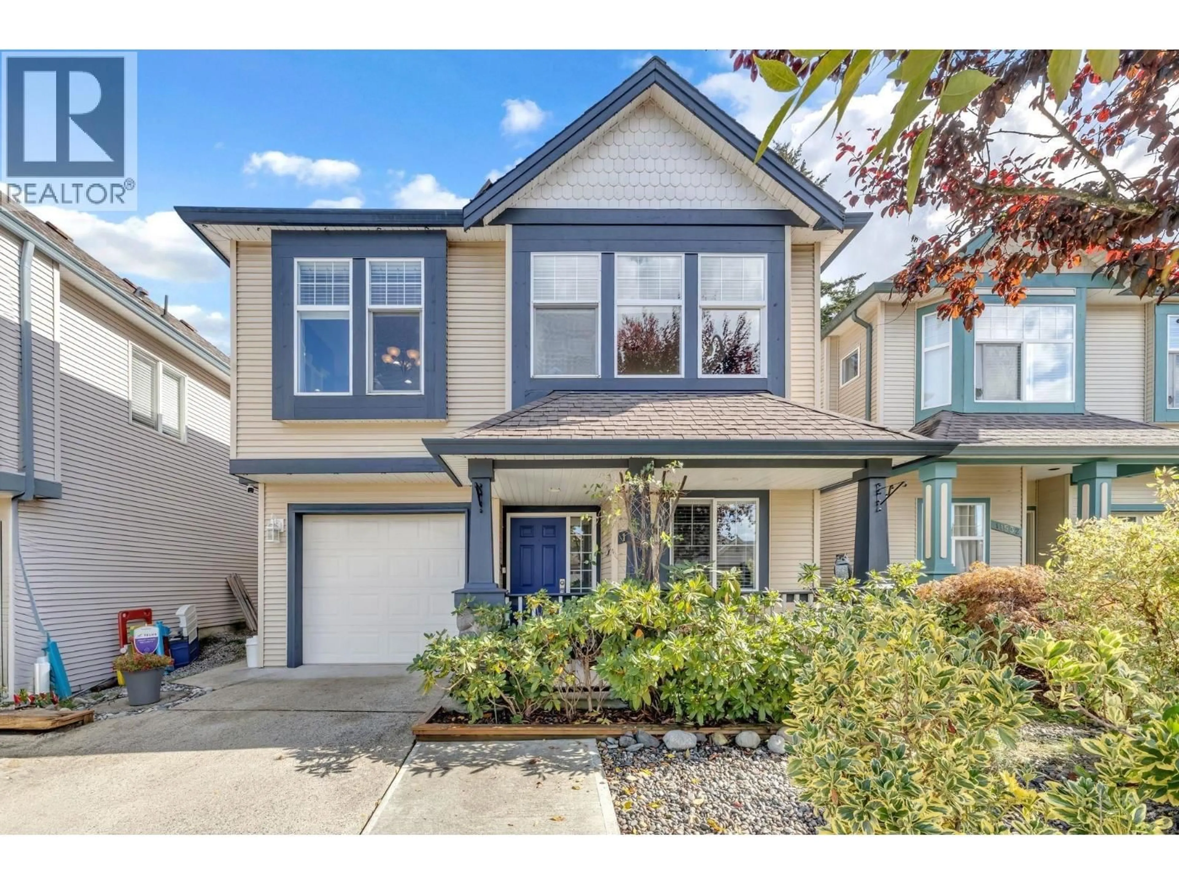 Home with vinyl exterior material, street for 11534 228 STREET, Maple Ridge British Columbia V2X3N6