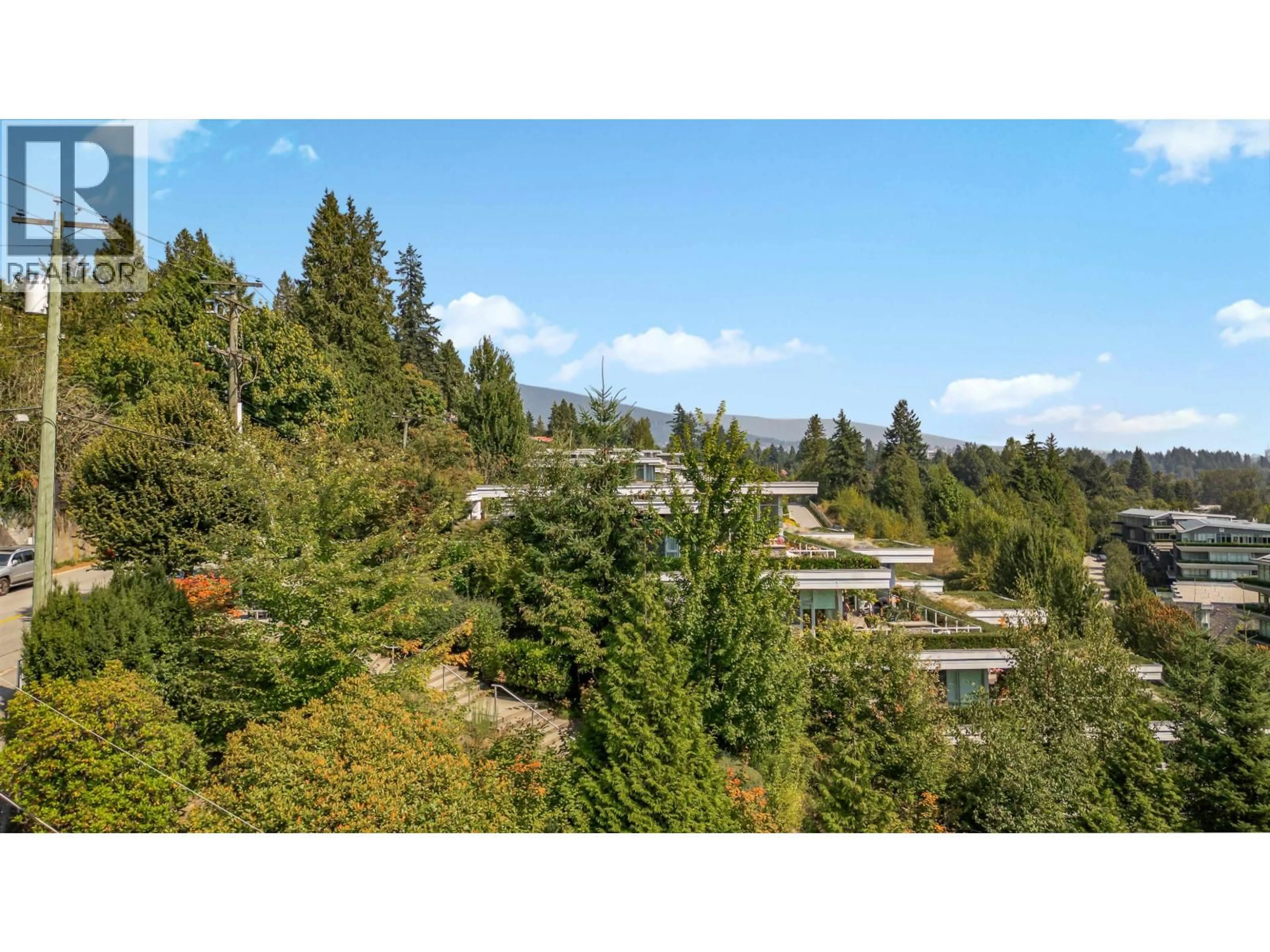 A pic from outside/outdoor area/front of a property/back of a property/a pic from drone, forest/trees view for 940 KEITH ROAD, West Vancouver British Columbia V7T1M3