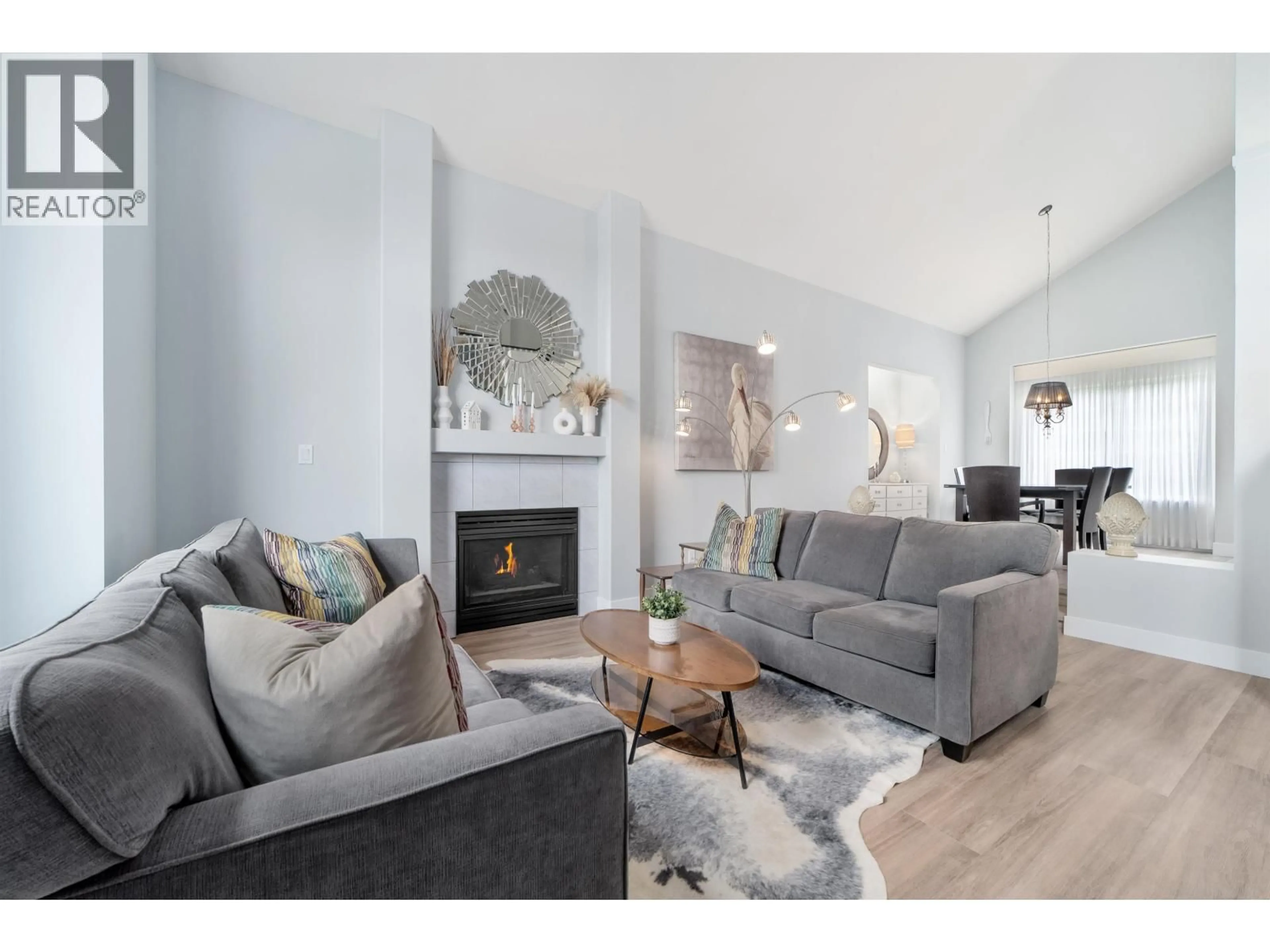 Living room with furniture, wood/laminate floor for 20530 124A AVENUE, Maple Ridge British Columbia V2X0L9