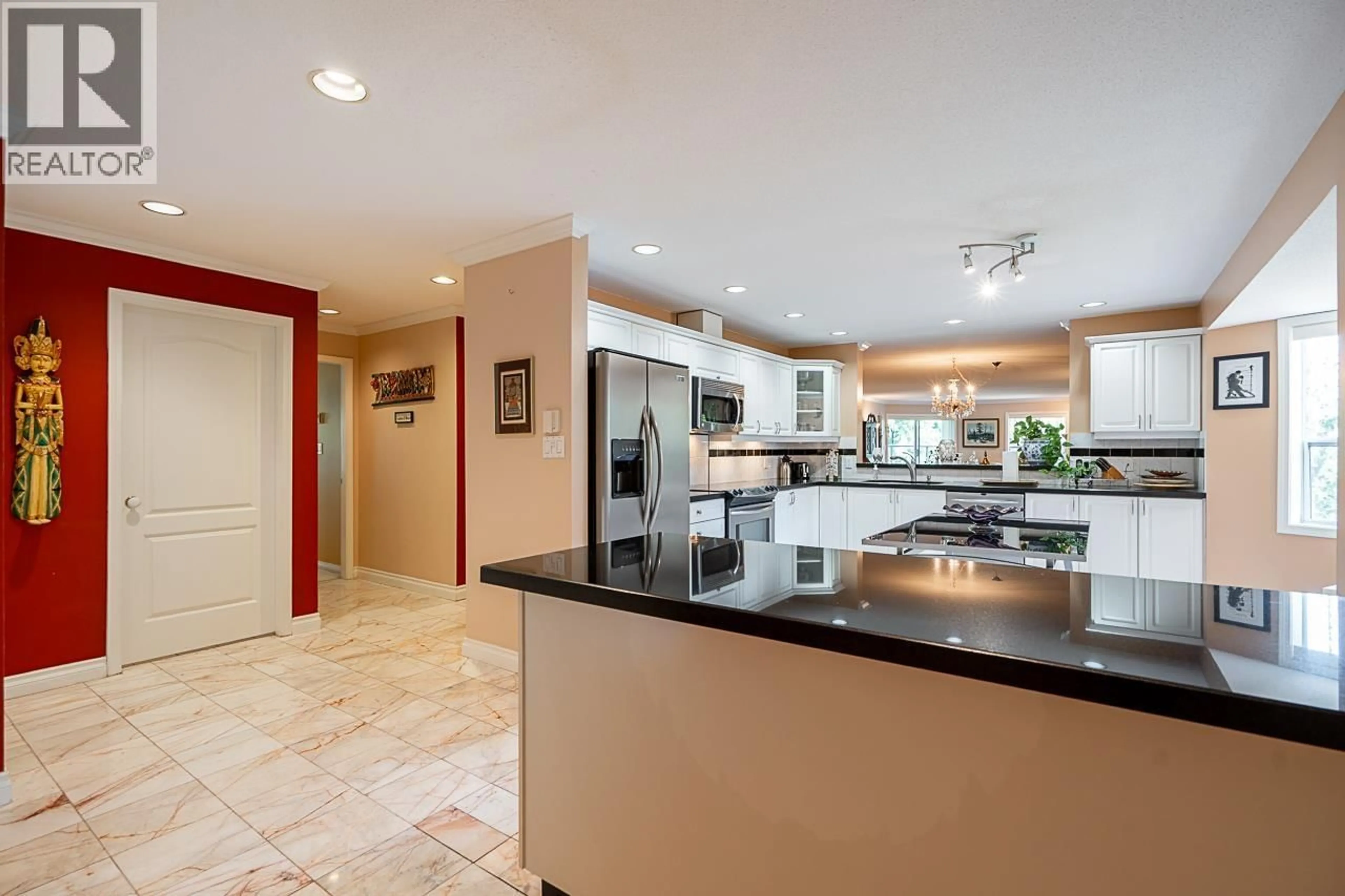Open concept kitchen, ceramic/tile floor for 507 - 1500 OSTLER COURT, North Vancouver British Columbia V7G2S2