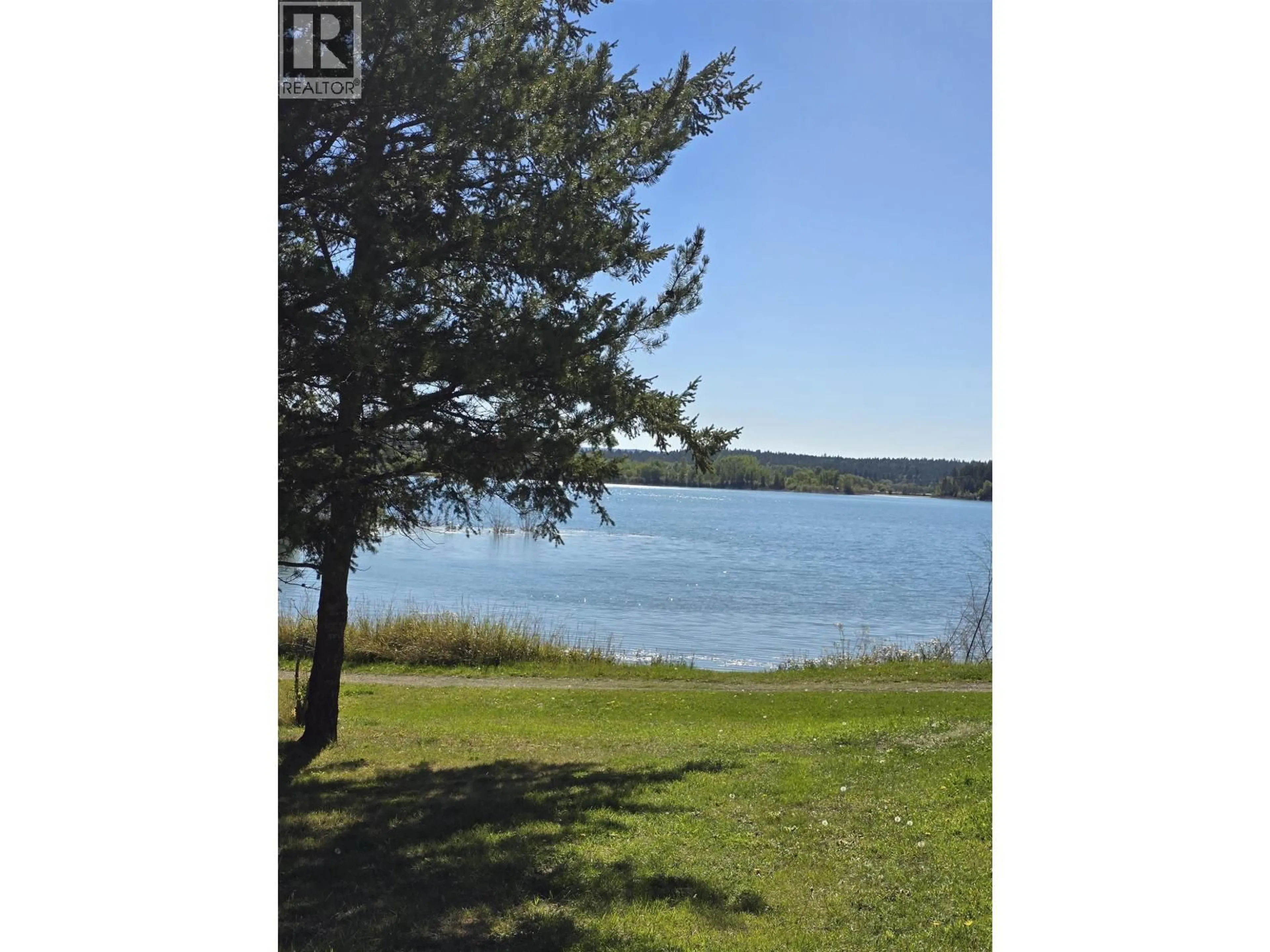 A pic from outside/outdoor area/front of a property/back of a property/a pic from drone, water/lake/river/ocean view for 4714 PARKER COURT, 108 Mile Ranch British Columbia V0K2Z0