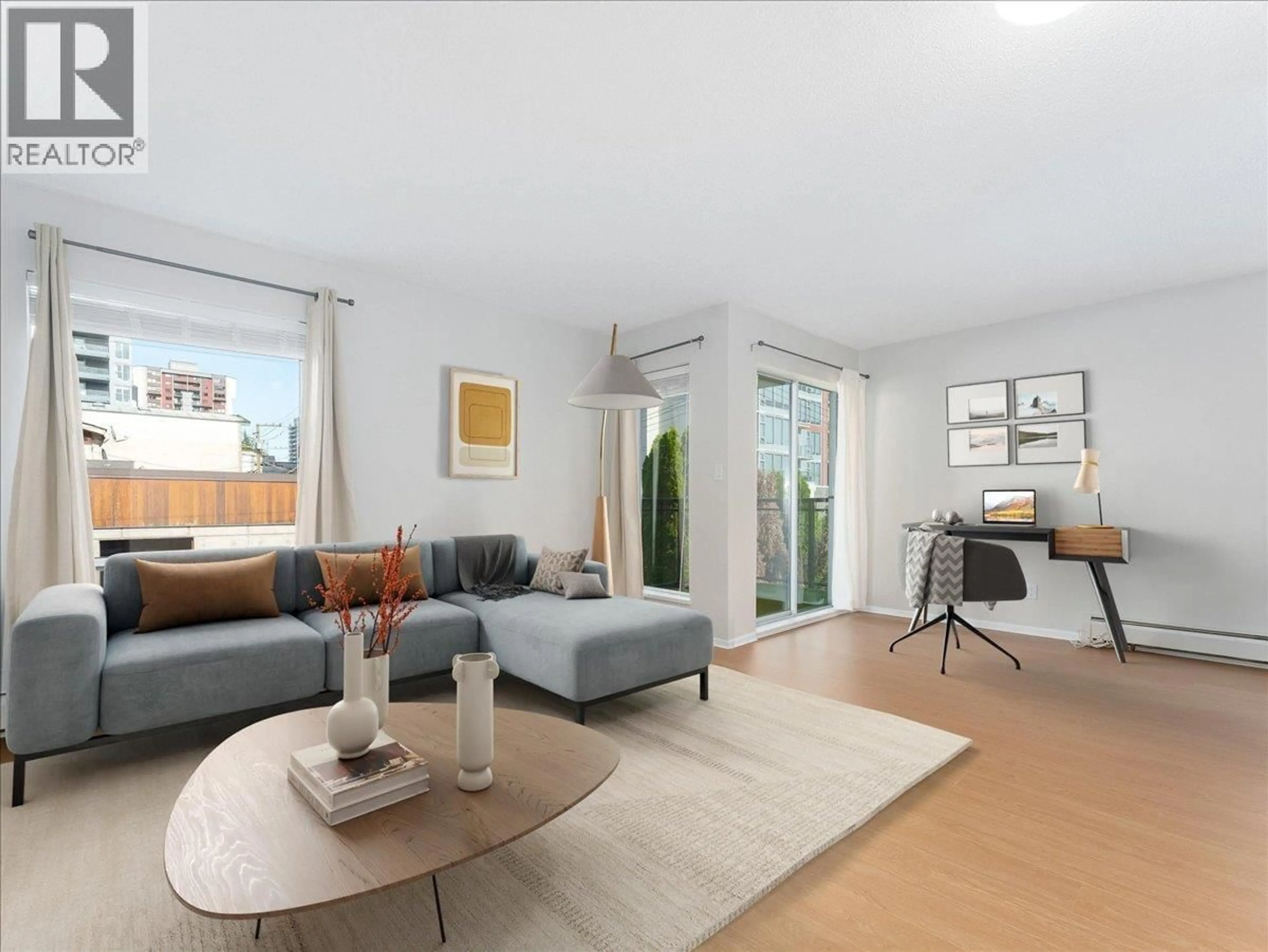 Living room with furniture, unknown for 202 - 1550 CHESTERFIELD AVENUE, North Vancouver British Columbia V7M2N6