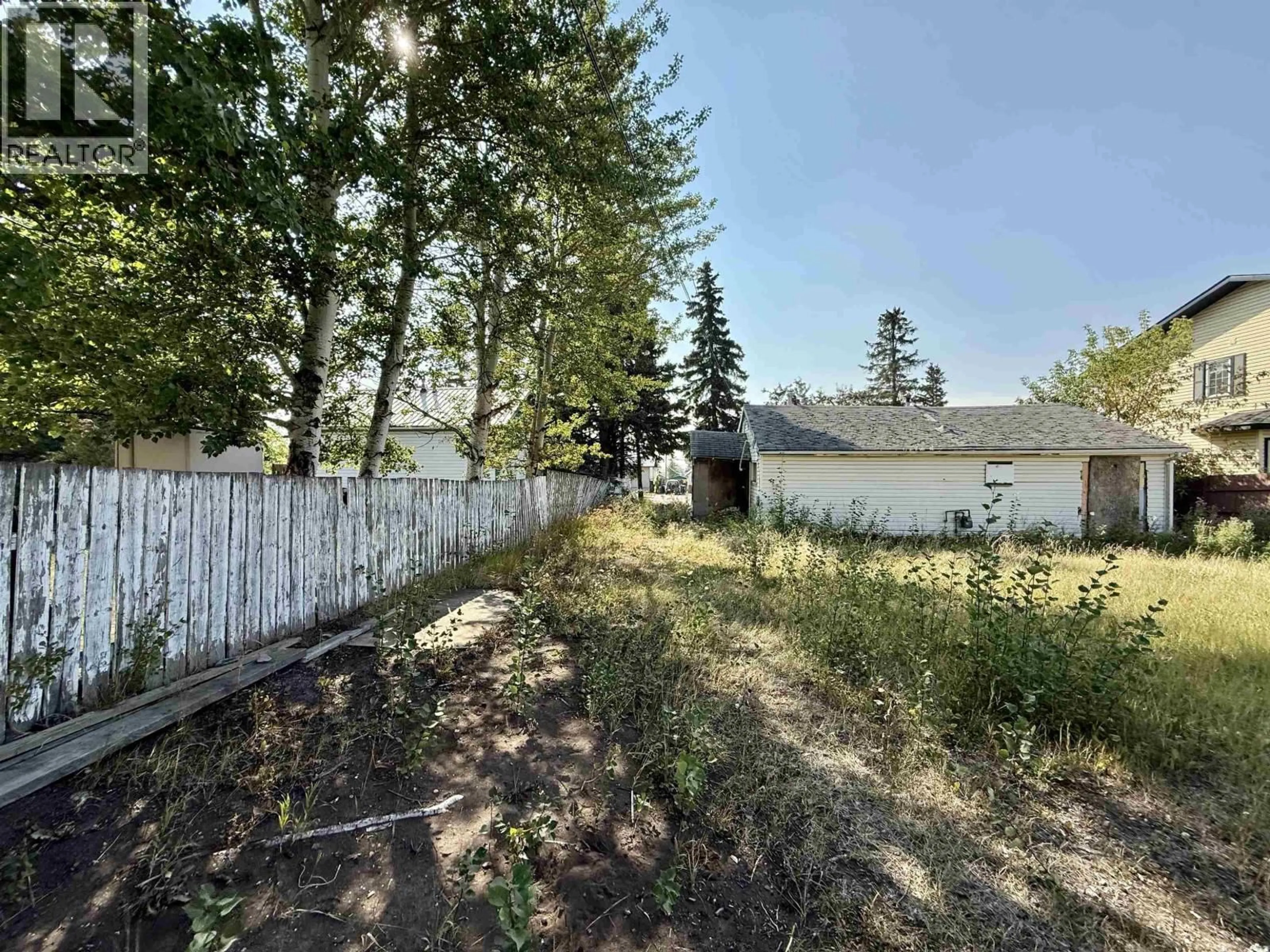 A pic from outside/outdoor area/front of a property/back of a property/a pic from drone, unknown for 9520 97 AVENUE, Fort St. John British Columbia V1J1M9