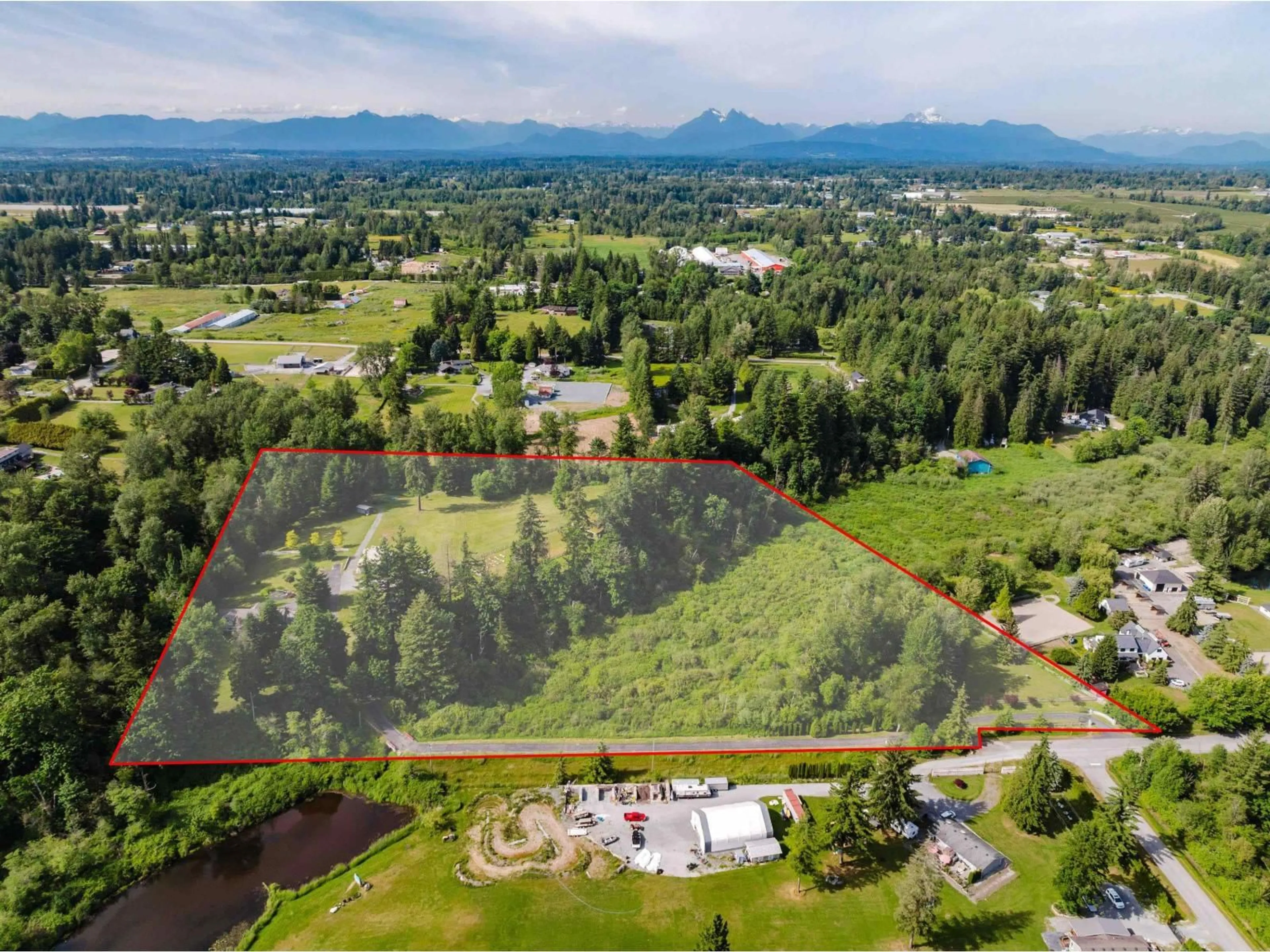 A pic from outside/outdoor area/front of a property/back of a property/a pic from drone, mountain view for 23731 12, Langley British Columbia V2Z2Y2