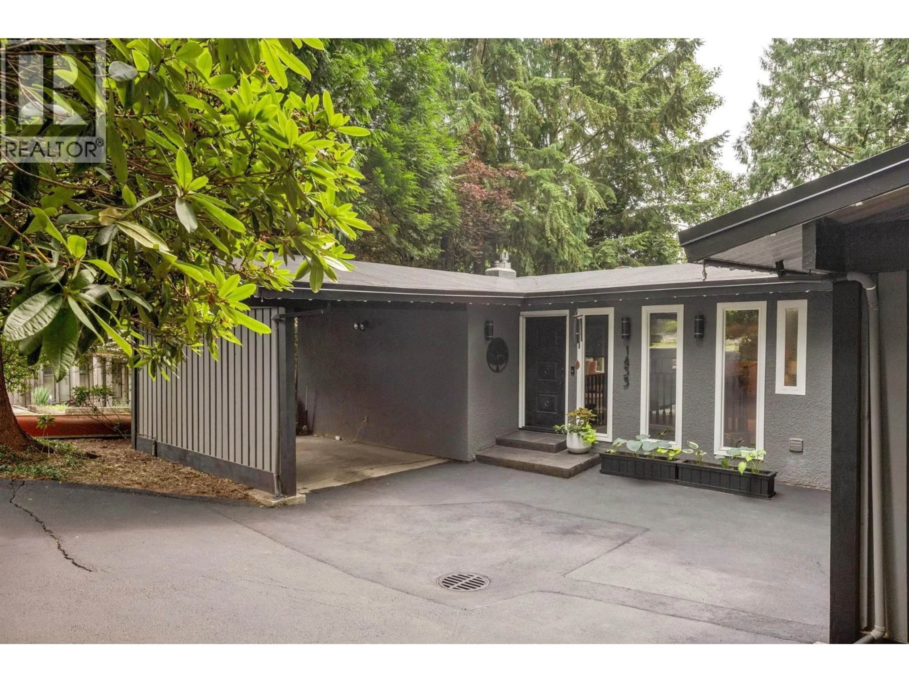 Home with vinyl exterior material, street for 1433 MCNAIR DRIVE, North Vancouver British Columbia V7K1X4