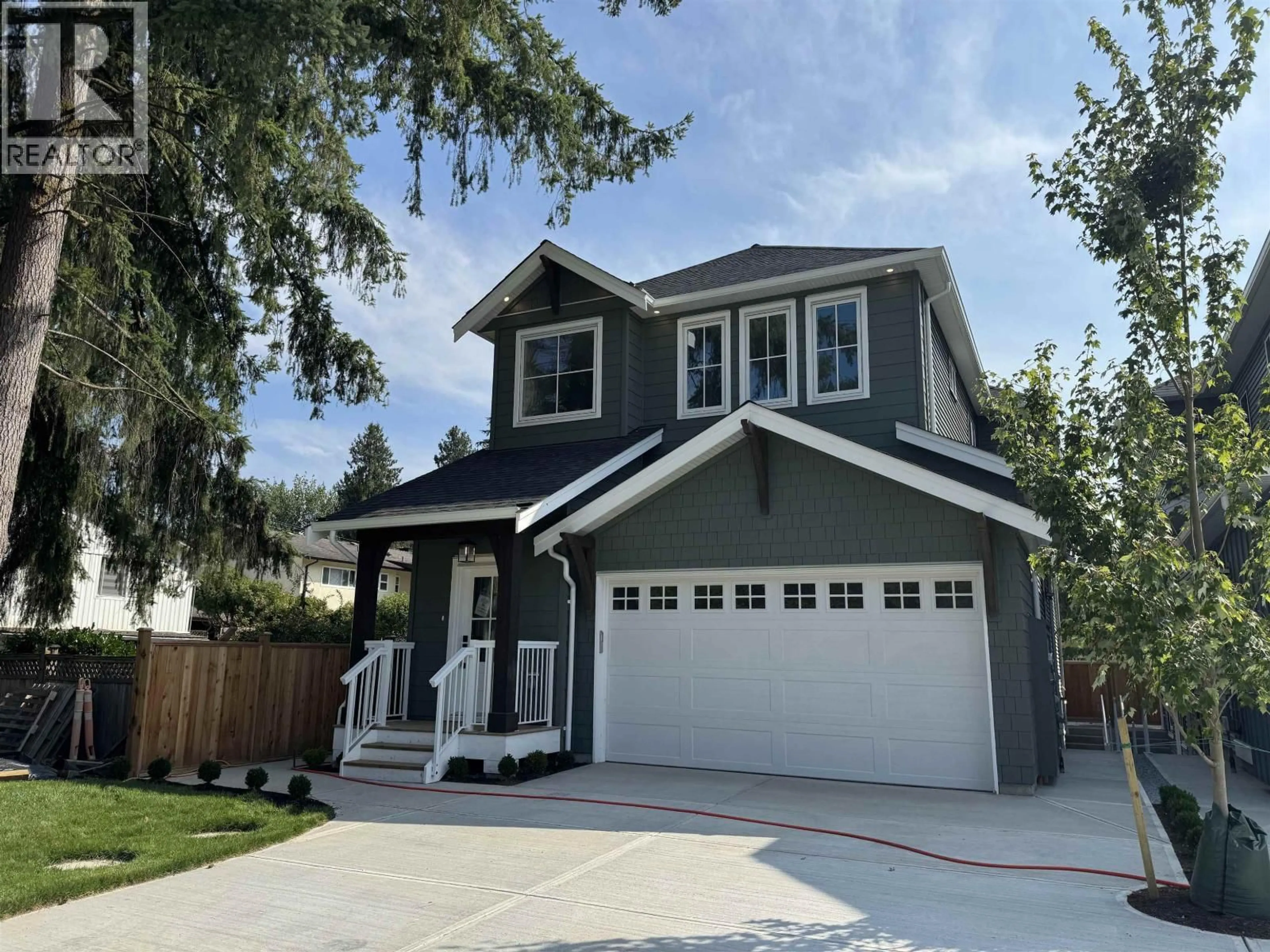 Home with vinyl exterior material, street for 19570 HAMMOND ROAD, Pitt Meadows British Columbia V3Y1L5