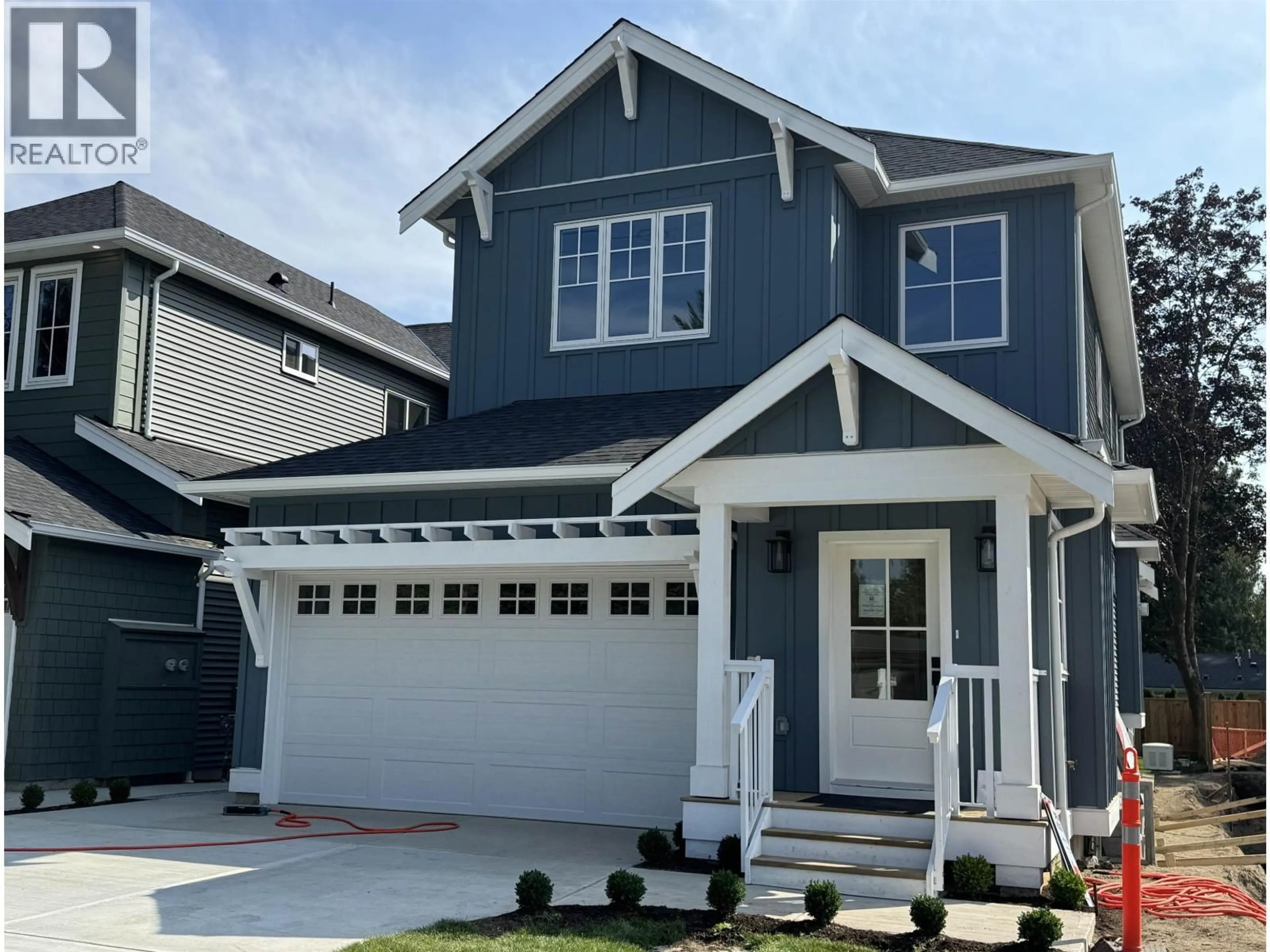 Home with vinyl exterior material, street for 19564 HAMMOND ROAD, Pitt Meadows British Columbia V3Y1L5