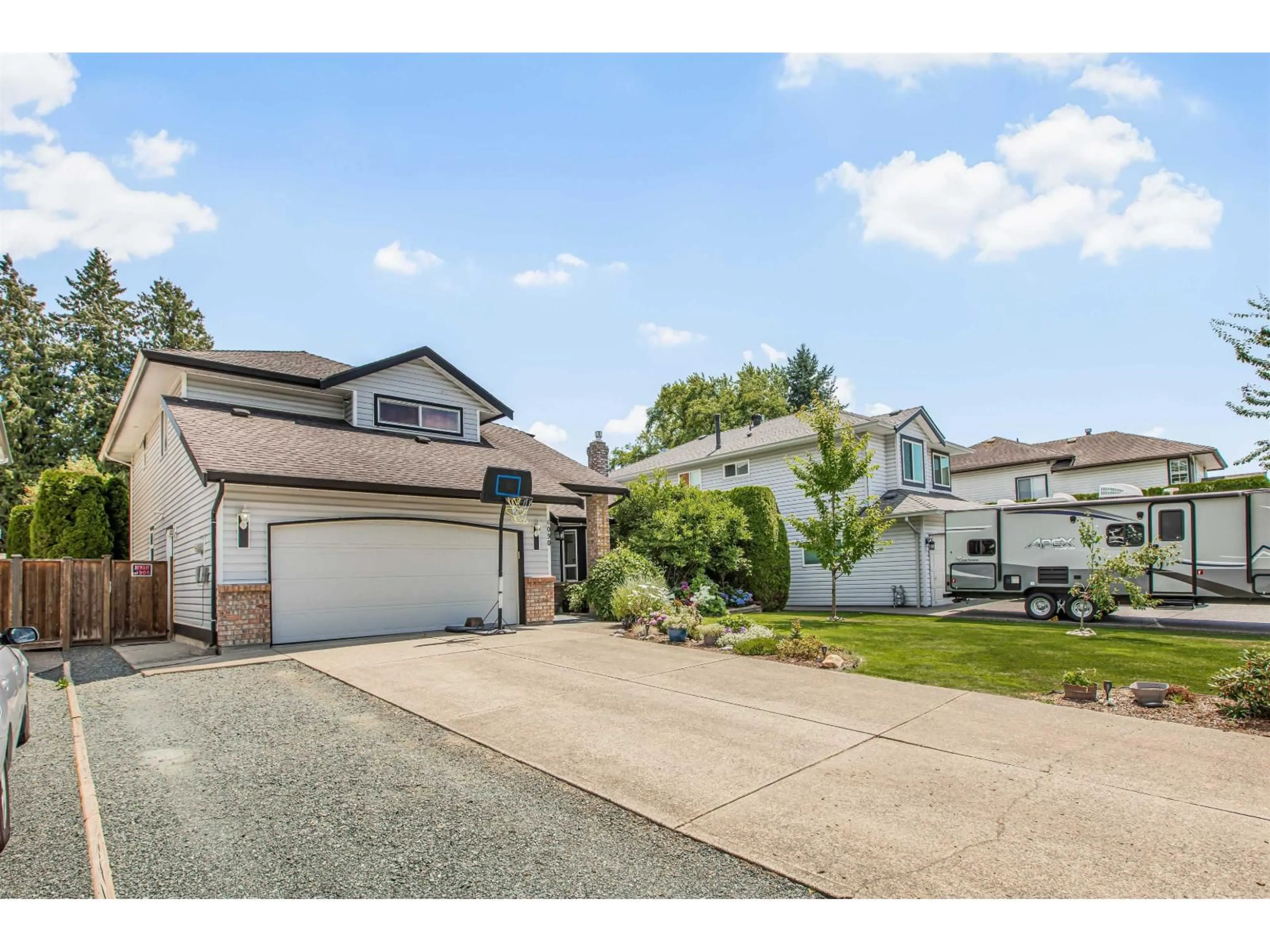 A pic from outside/outdoor area/front of a property/back of a property/a pic from drone, street for 6090 187A, Surrey British Columbia V3S7R6