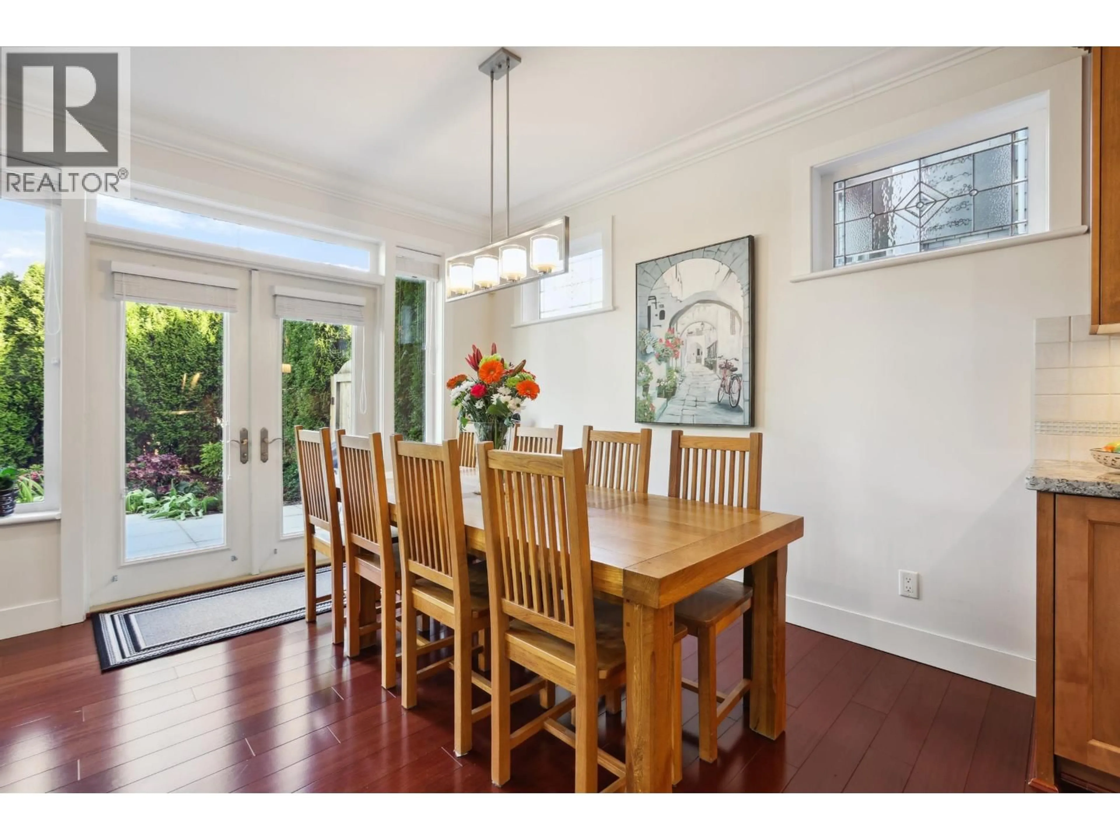 Dining room, wood/laminate floor for 3487 2ND AVENUE, Vancouver British Columbia V6R1J3