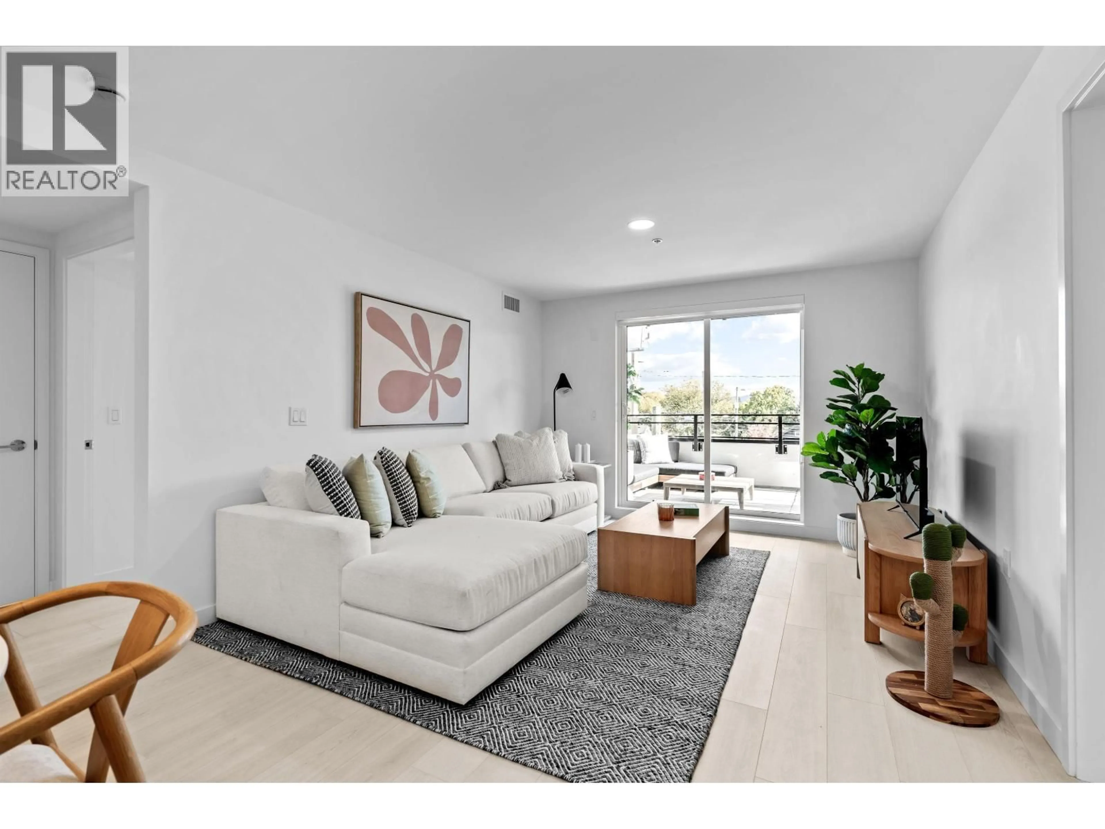 Living room with furniture, unknown for 310 - 2419 GRANT STREET, Vancouver British Columbia V5K3G5