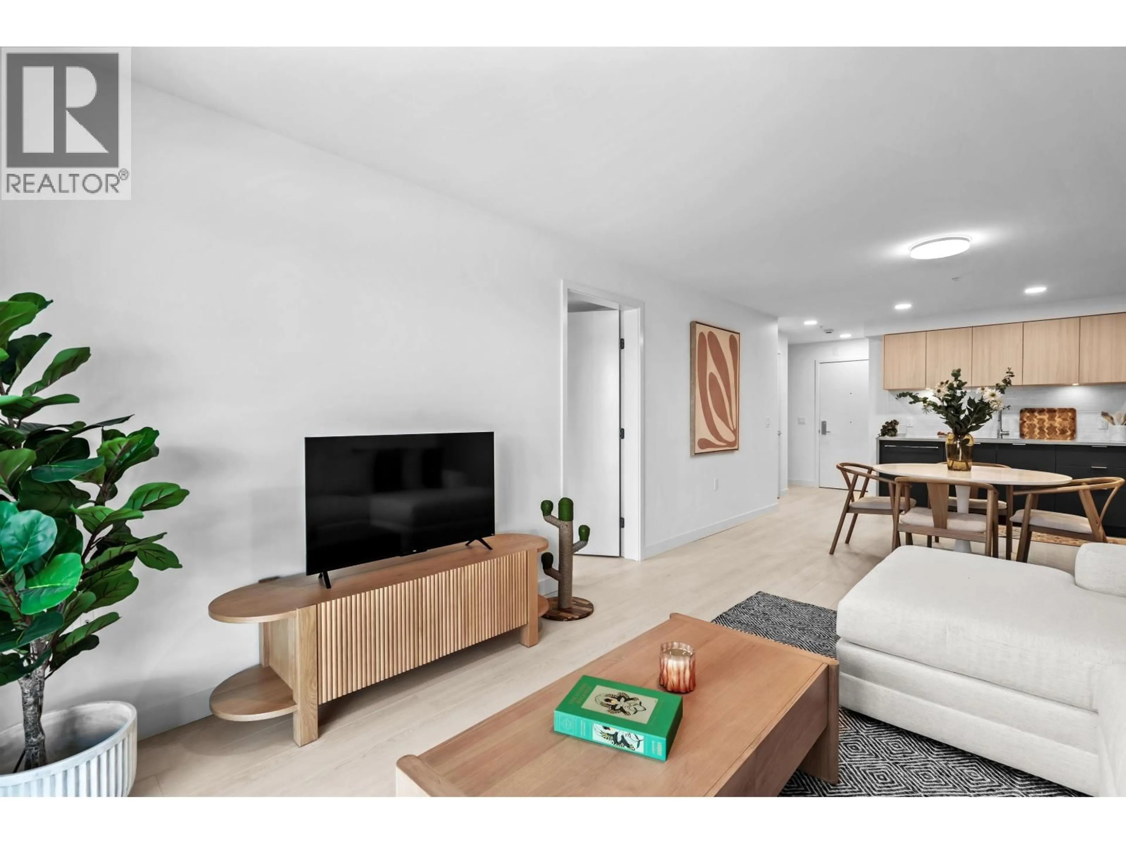Living room with furniture, unknown for 310 - 2419 GRANT STREET, Vancouver British Columbia V5K3G5