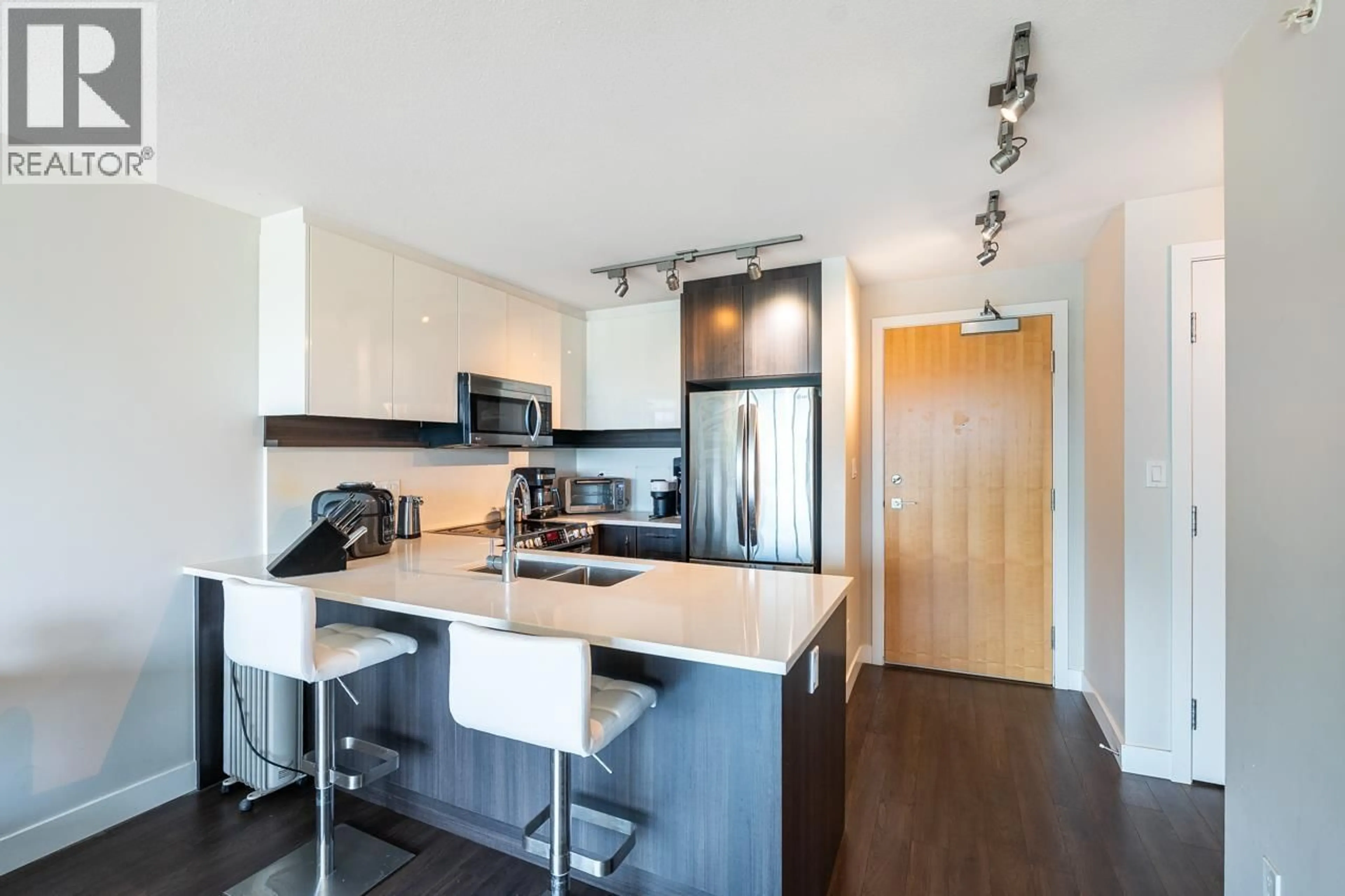 Open concept kitchen, wood/laminate floor for 1606 - 958 RIDGEWAY AVENUE, Coquitlam British Columbia V3K0C5