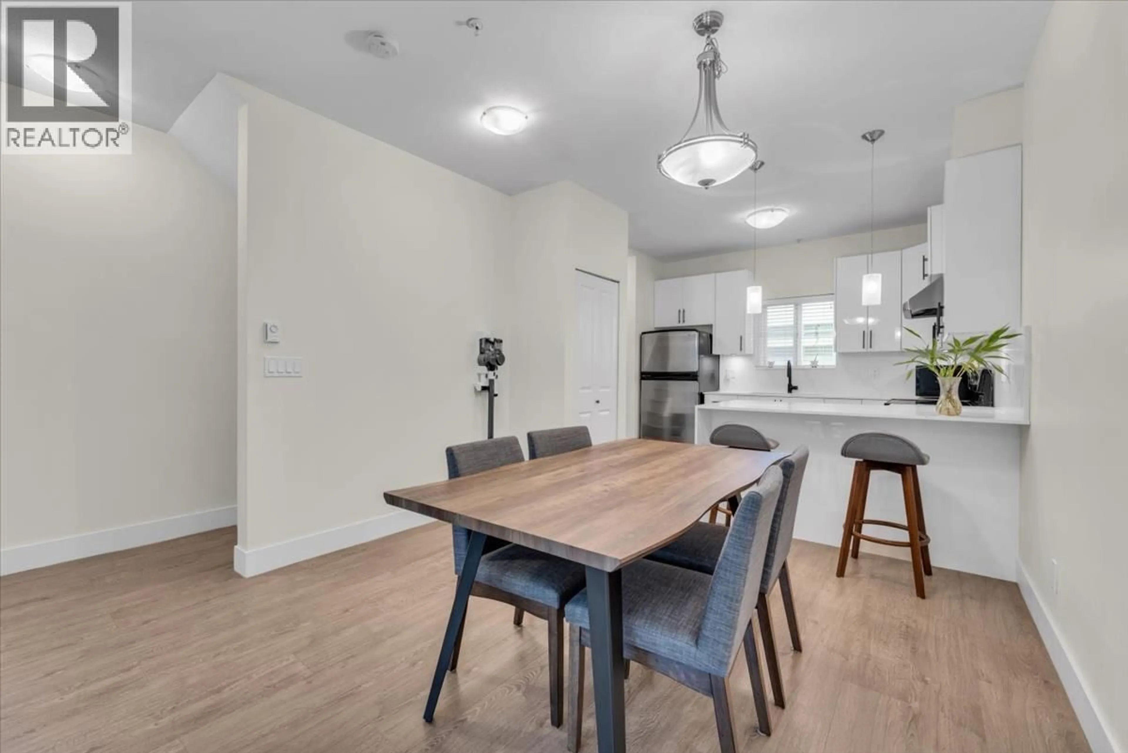 Open concept kitchen, wood/laminate floor for 206 - 3888 NORFOLK STREET, Burnaby British Columbia V5G1E5