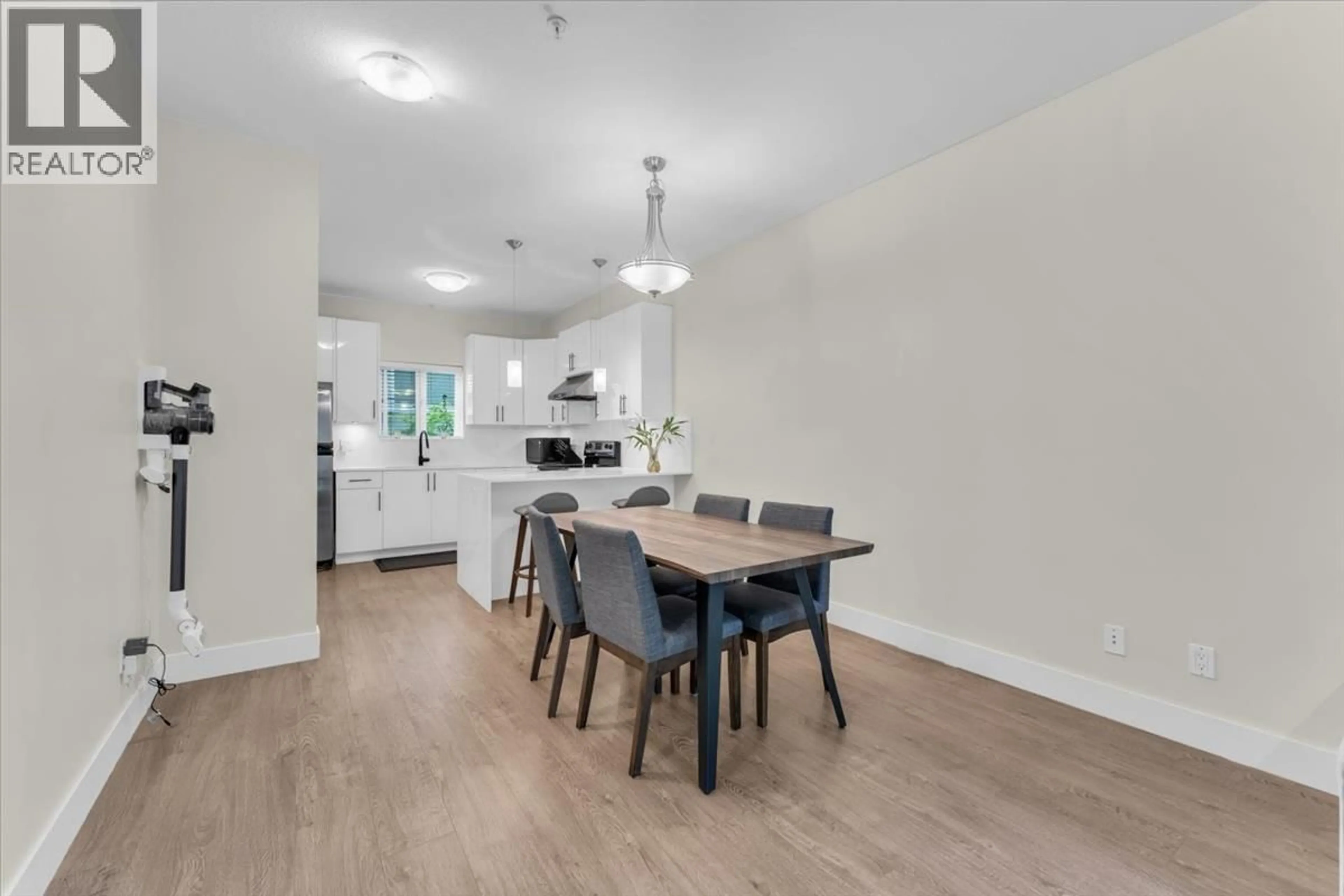 Open concept kitchen, wood/laminate floor for 206 - 3888 NORFOLK STREET, Burnaby British Columbia V5G1E5