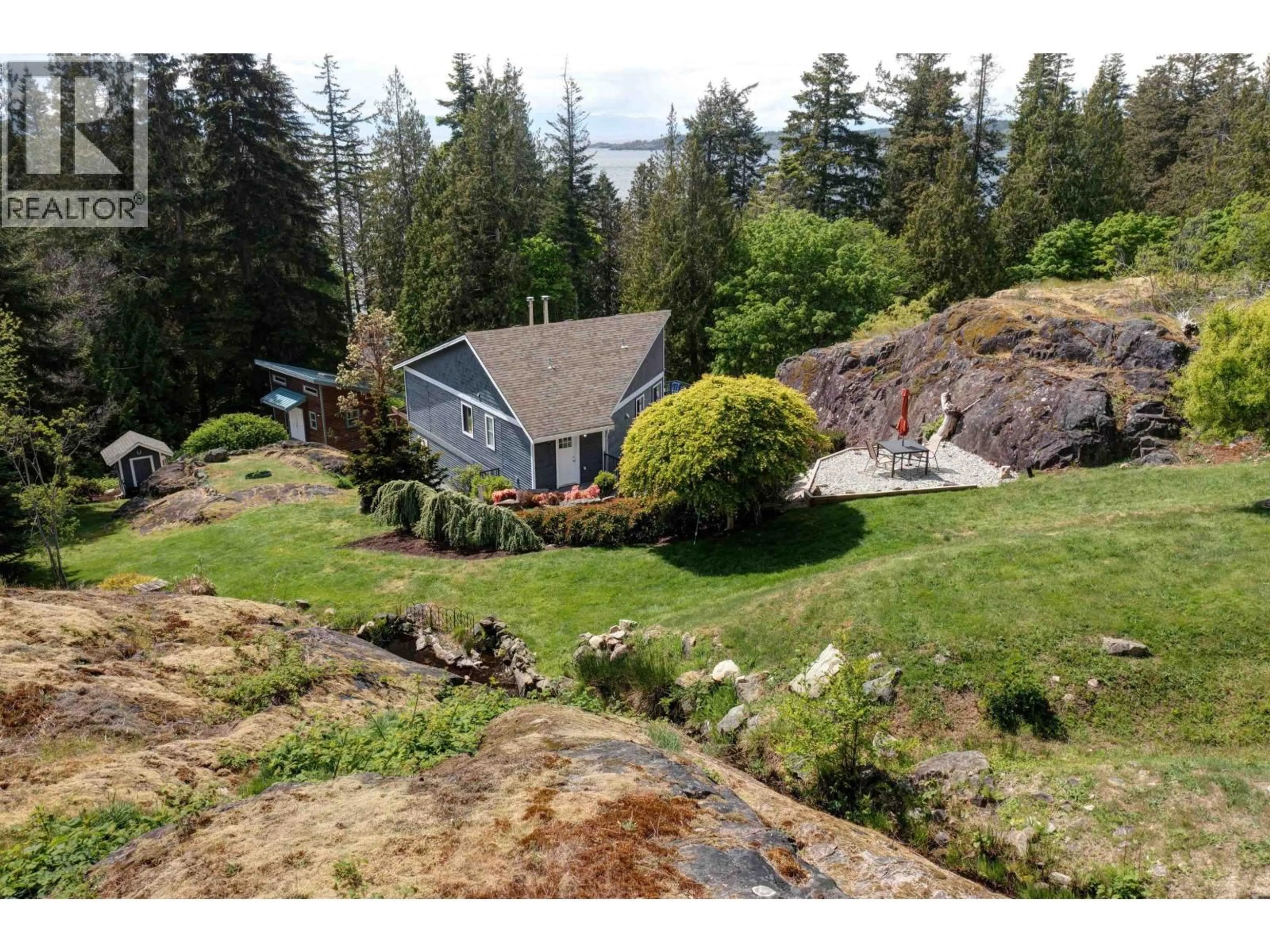 A pic from outside/outdoor area/front of a property/back of a property/a pic from drone, unknown for 8362 REDROOFFS ROAD, Halfmoon Bay British Columbia V7Z1E5