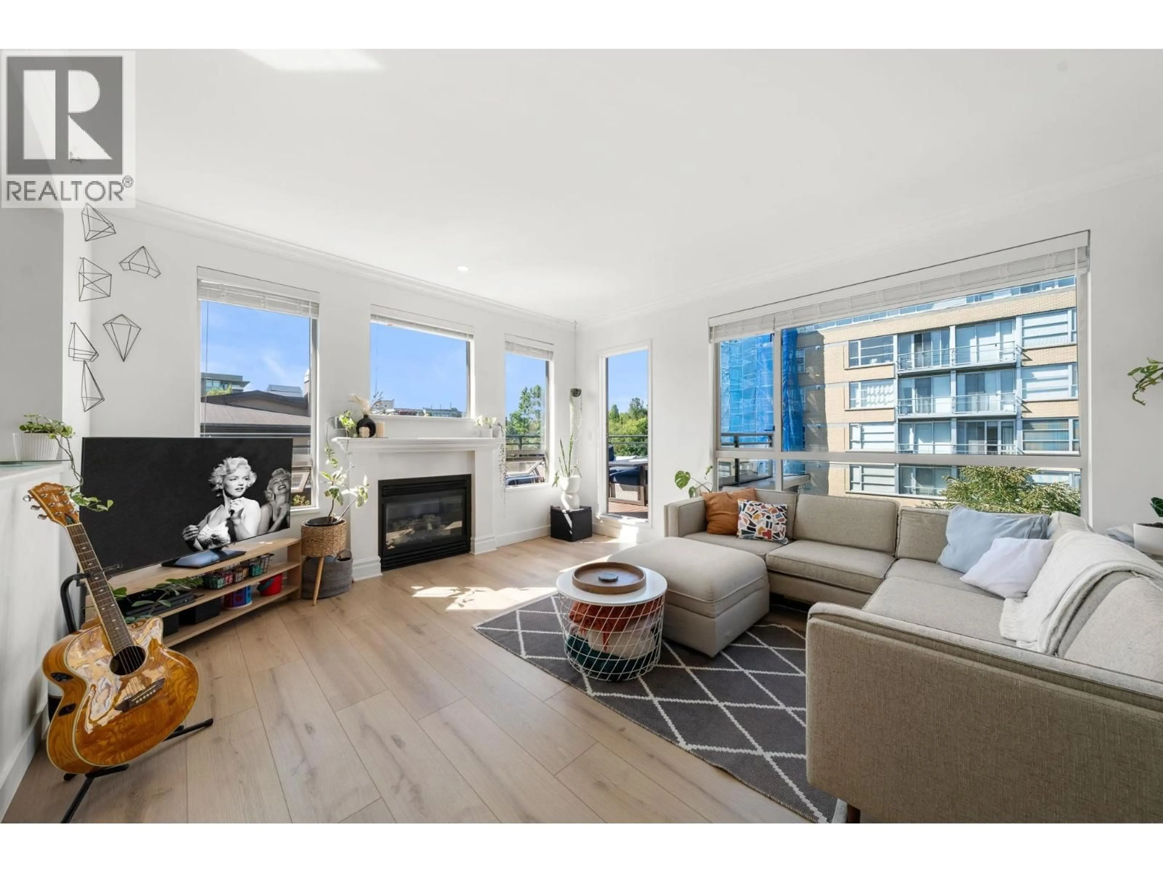 Living room with furniture, wood/laminate floor for 400 - 2175 SALAL DRIVE, Vancouver British Columbia V6K4V2