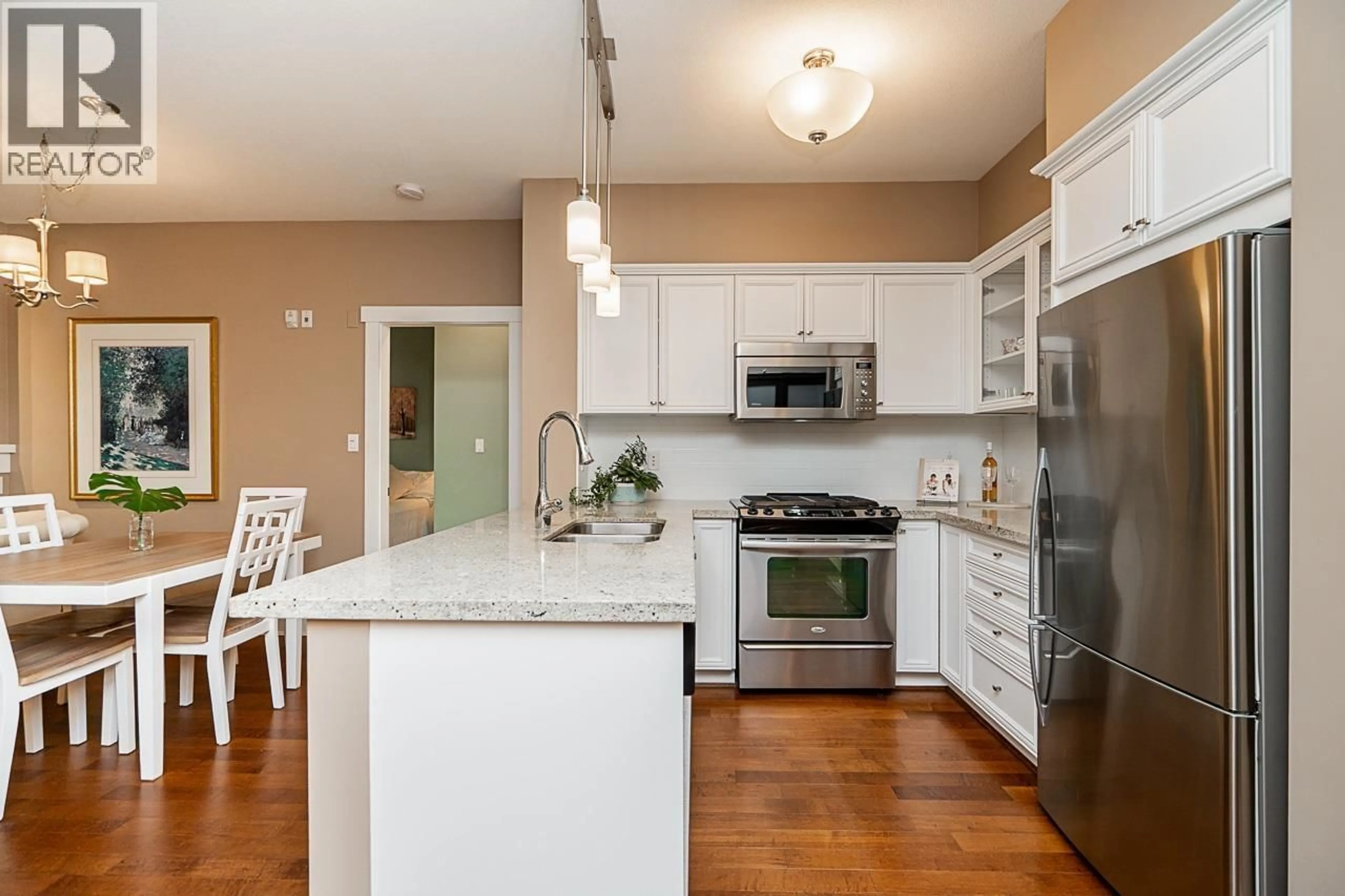 Open concept kitchen, unknown for 107 - 1111 E 27TH STREET, North Vancouver British Columbia V7J1S3