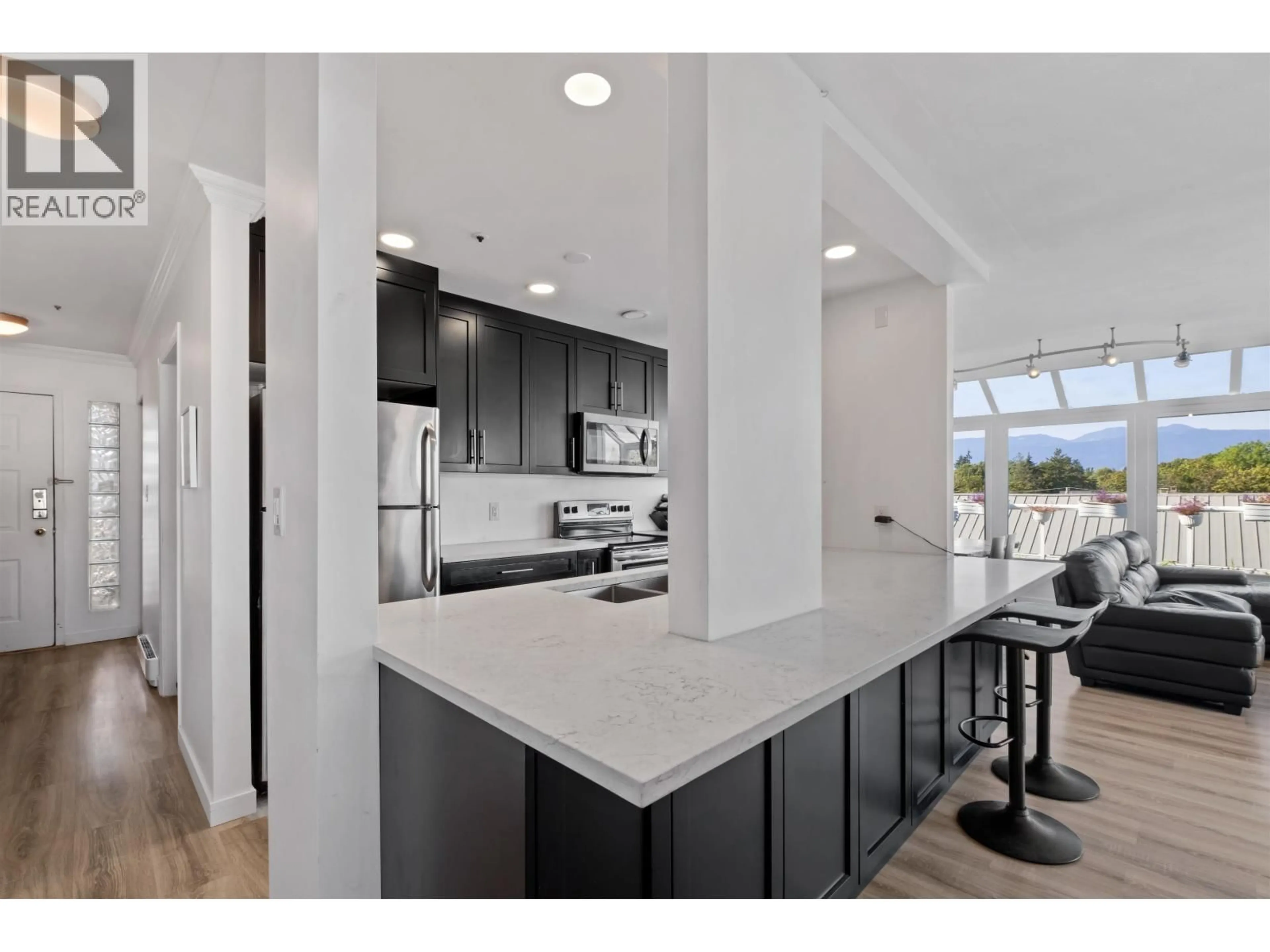 Open concept kitchen, unknown for 403 - 3505 BROADWAY, Vancouver British Columbia V6R2B5