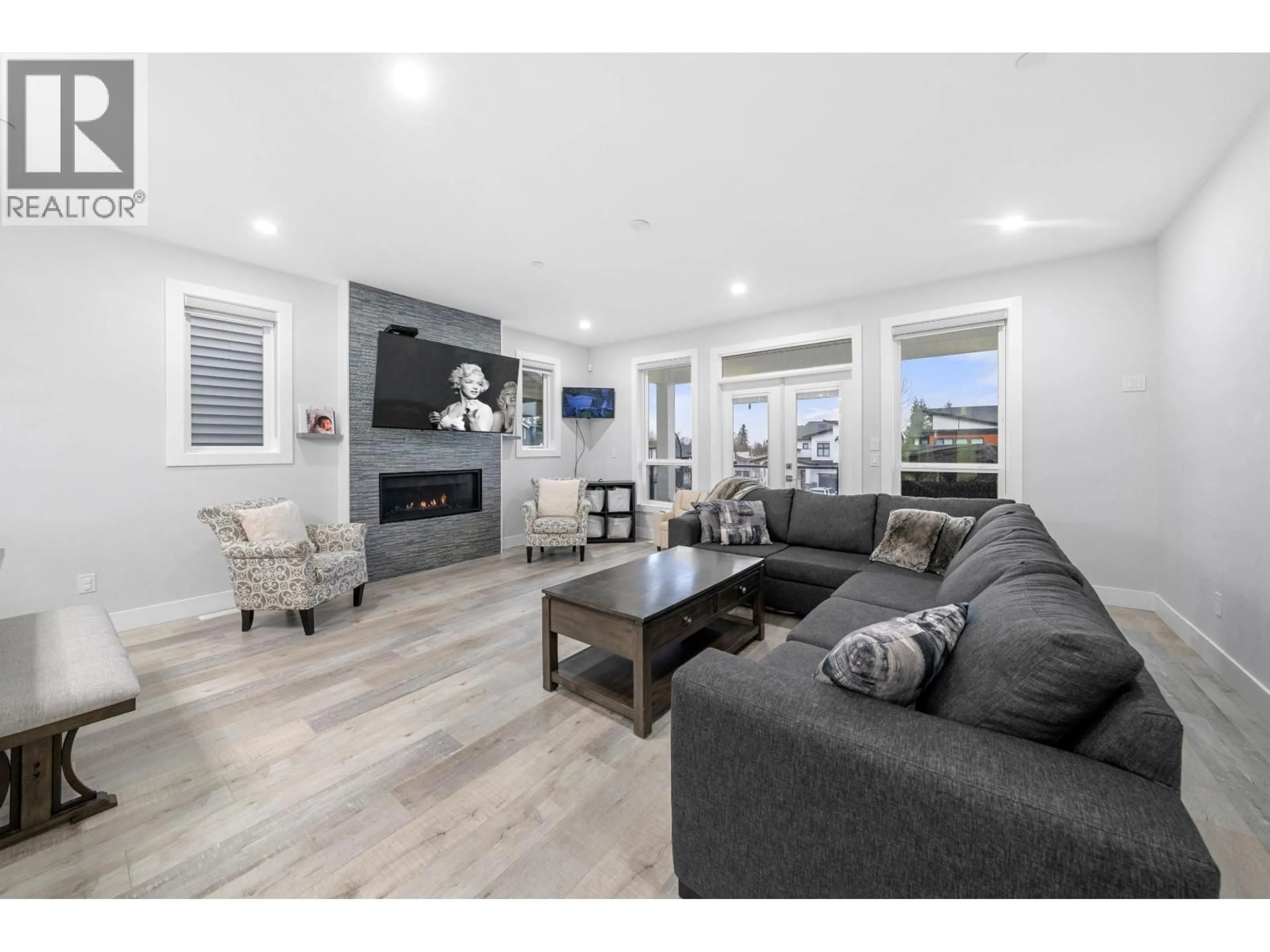 Living room with furniture, wood/laminate floor for 24629 105A AVENUE, Maple Ridge British Columbia V2W0K3
