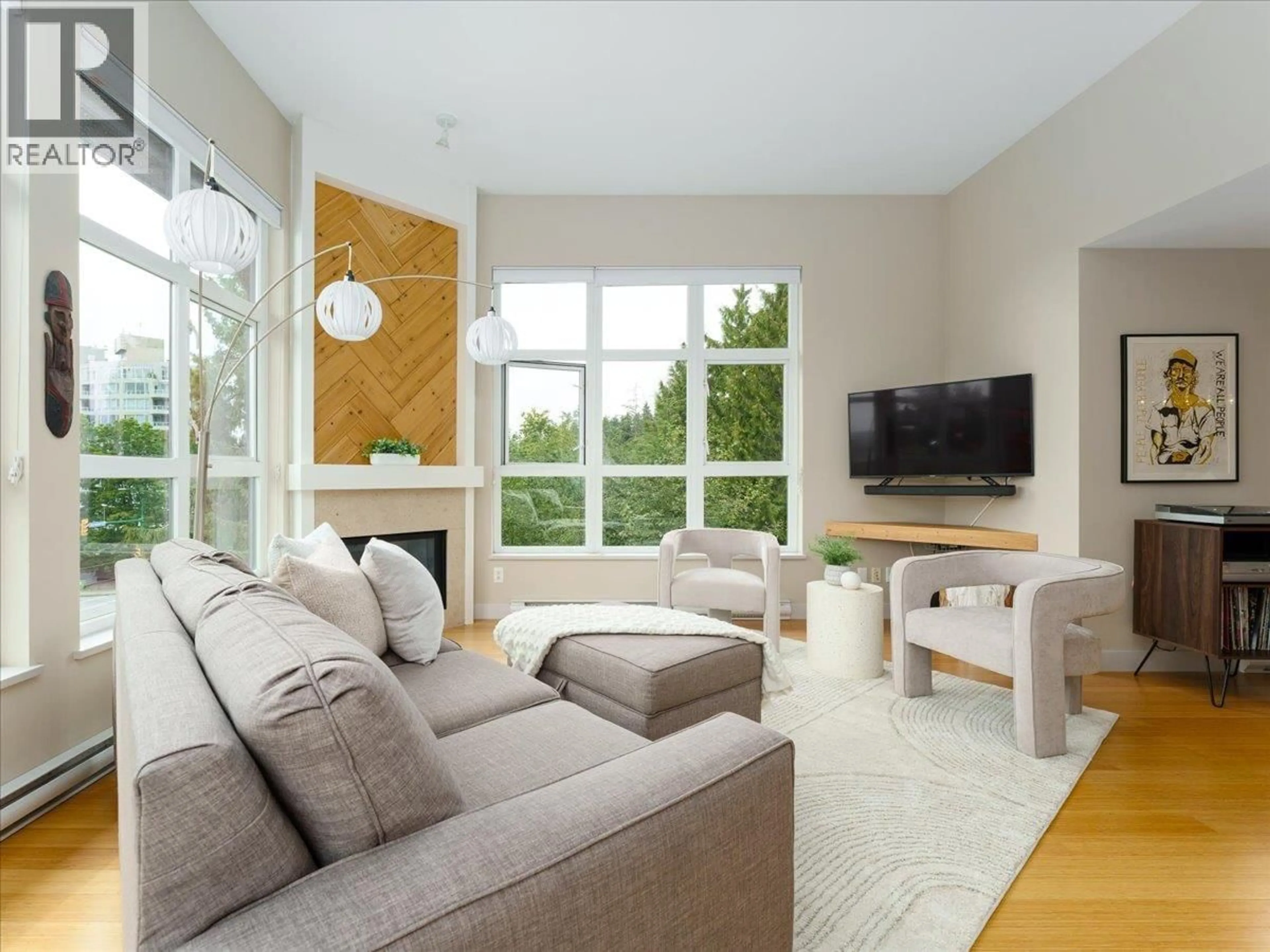 Living room with furniture, unknown for 402 - 3732 MT SEYMOUR PARKWAY, North Vancouver British Columbia V7G1C3