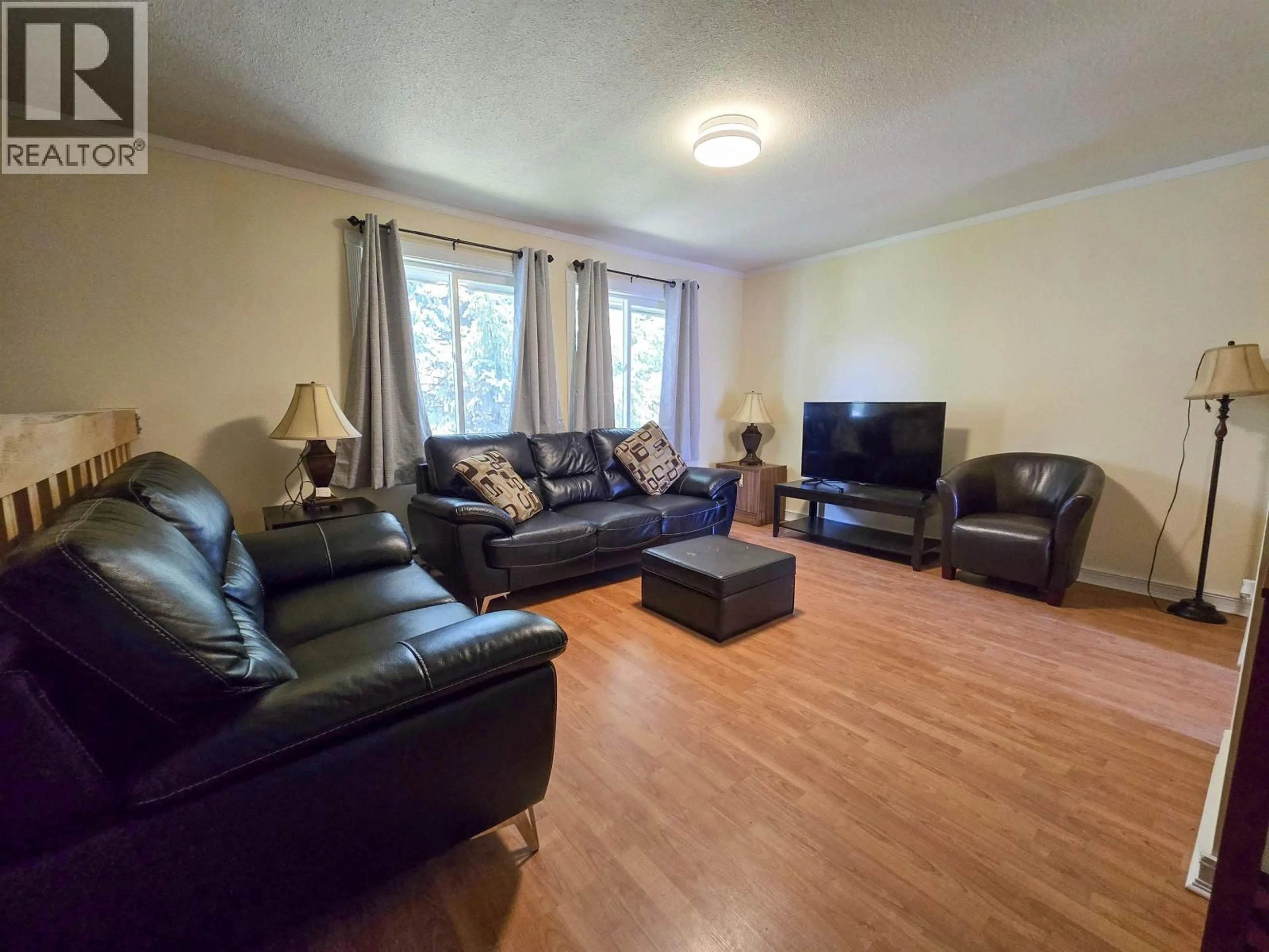 Living room with furniture, wood/laminate floor for 10 GANDER CRESCENT, Kitimat British Columbia V8C1P5