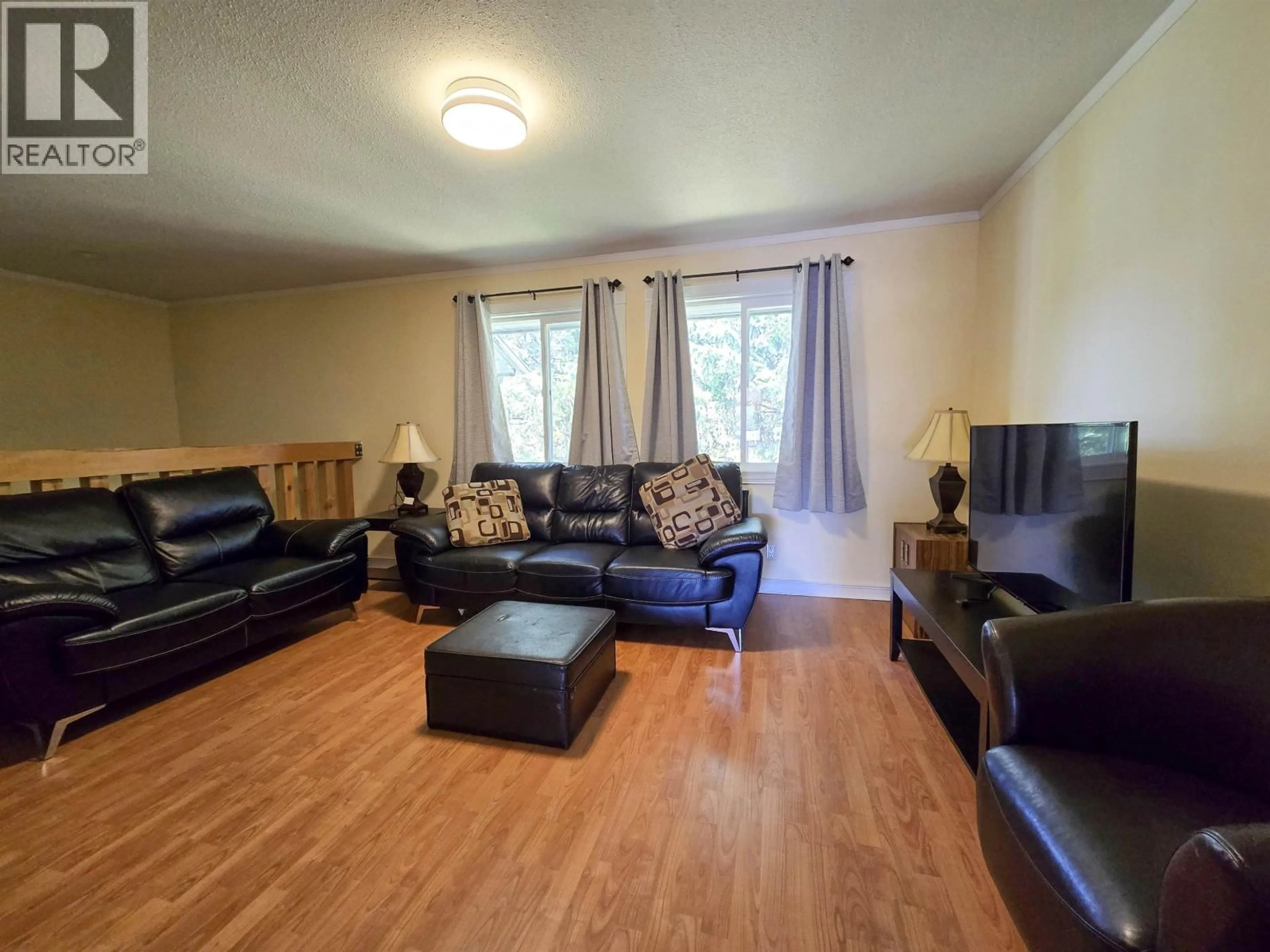 Living room with furniture, wood/laminate floor for 10 GANDER CRESCENT, Kitimat British Columbia V8C1P5