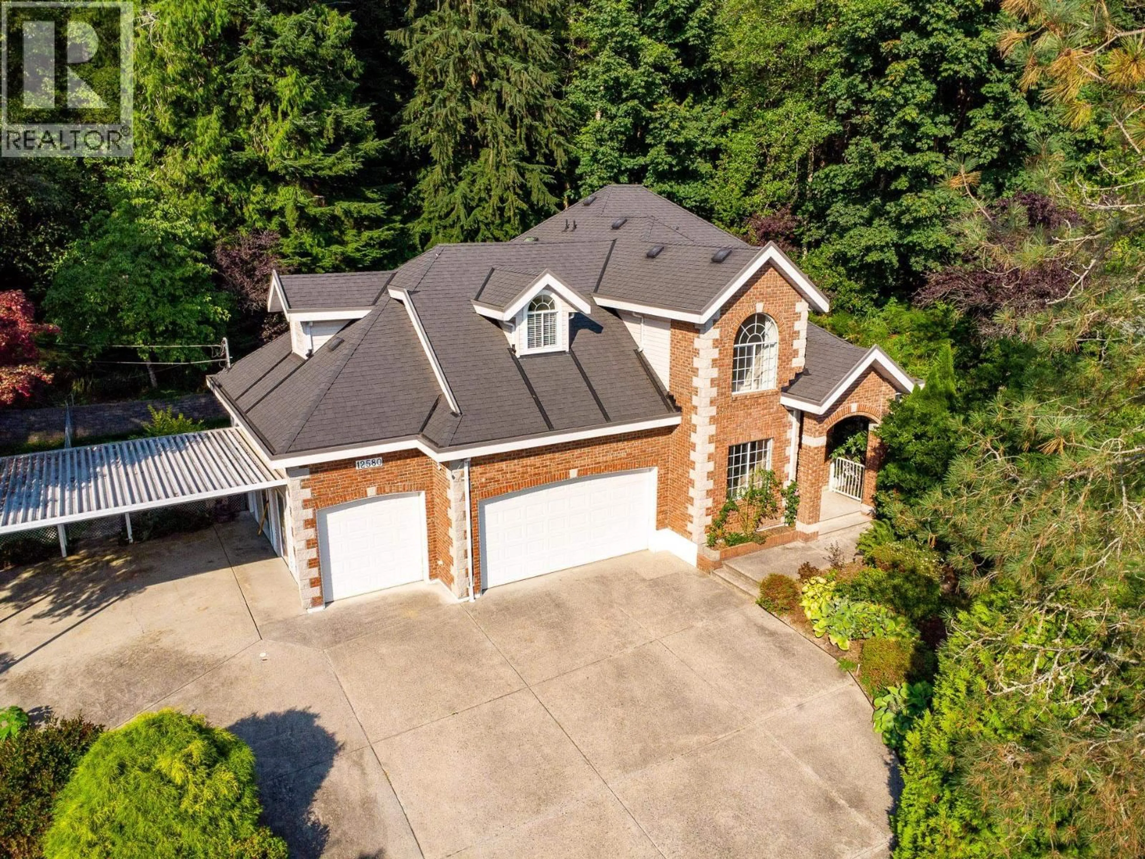 A pic from outside/outdoor area/front of a property/back of a property/a pic from drone, street for 12580 261 STREET, Maple Ridge British Columbia V2W1C4
