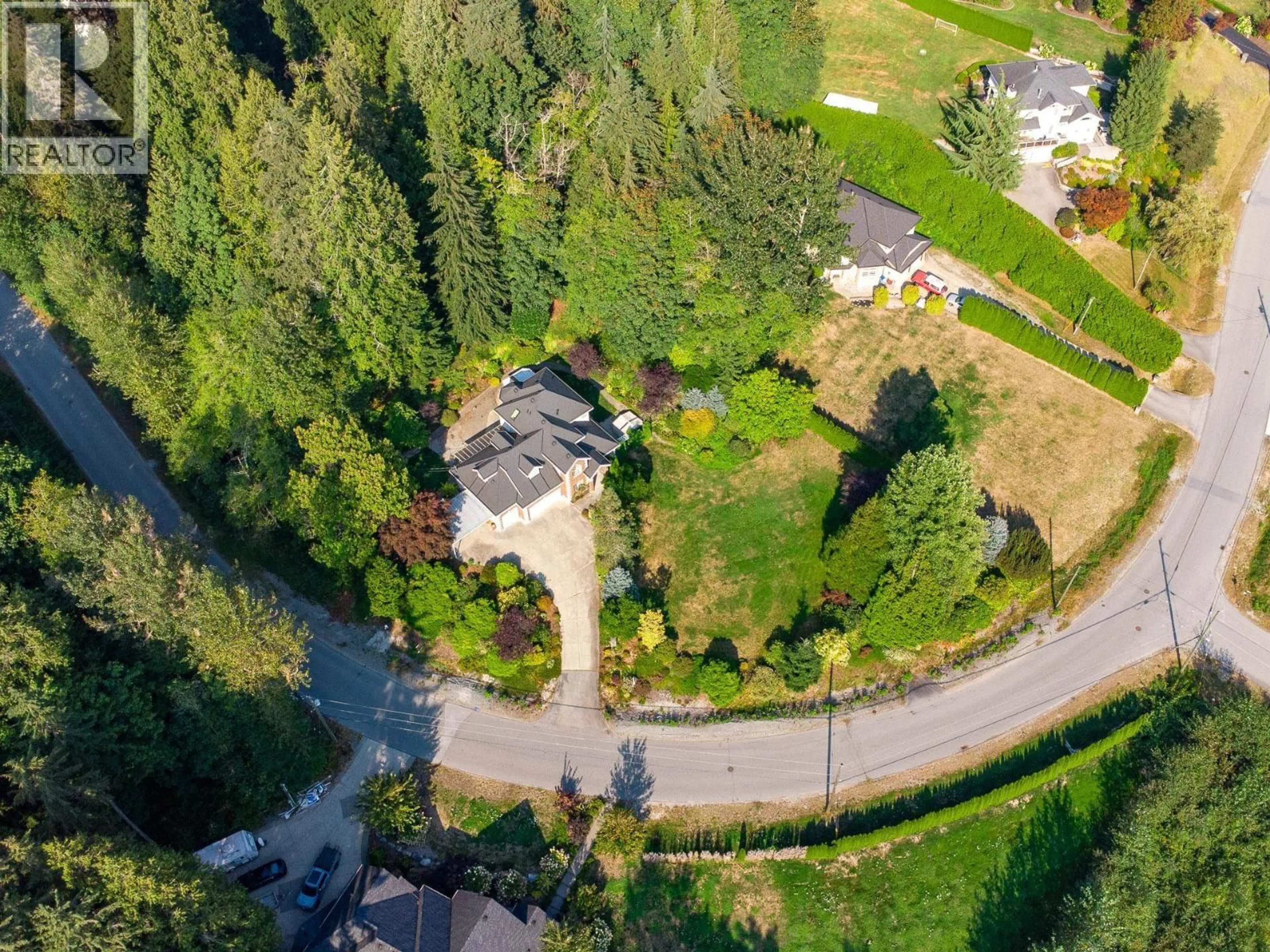 A pic from outside/outdoor area/front of a property/back of a property/a pic from drone, unknown for 12580 261 STREET, Maple Ridge British Columbia V2W1C4