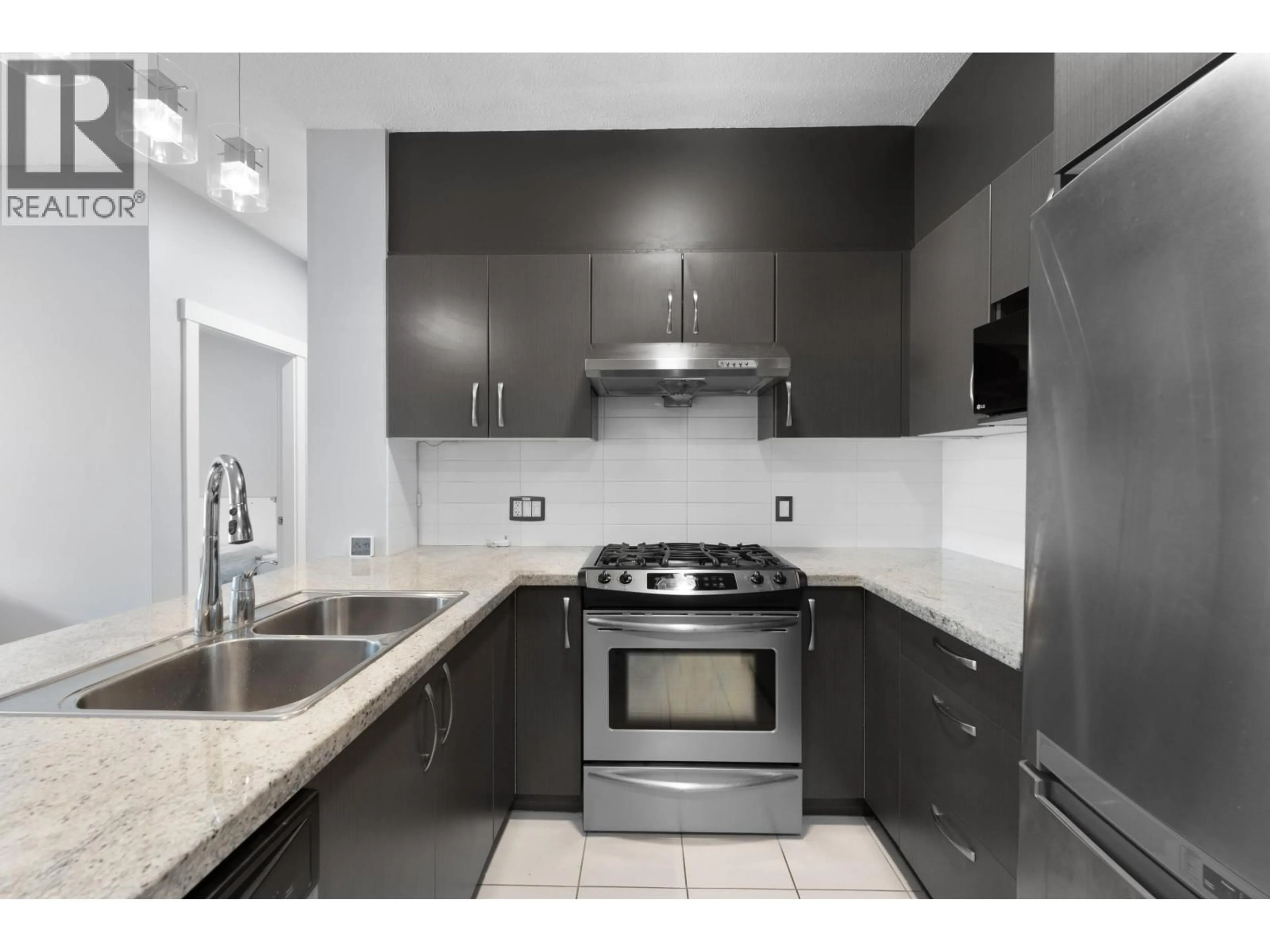 Standard kitchen, ceramic/tile floor for 412 - 9299 TOMICKI AVENUE, Richmond British Columbia V6X0C5
