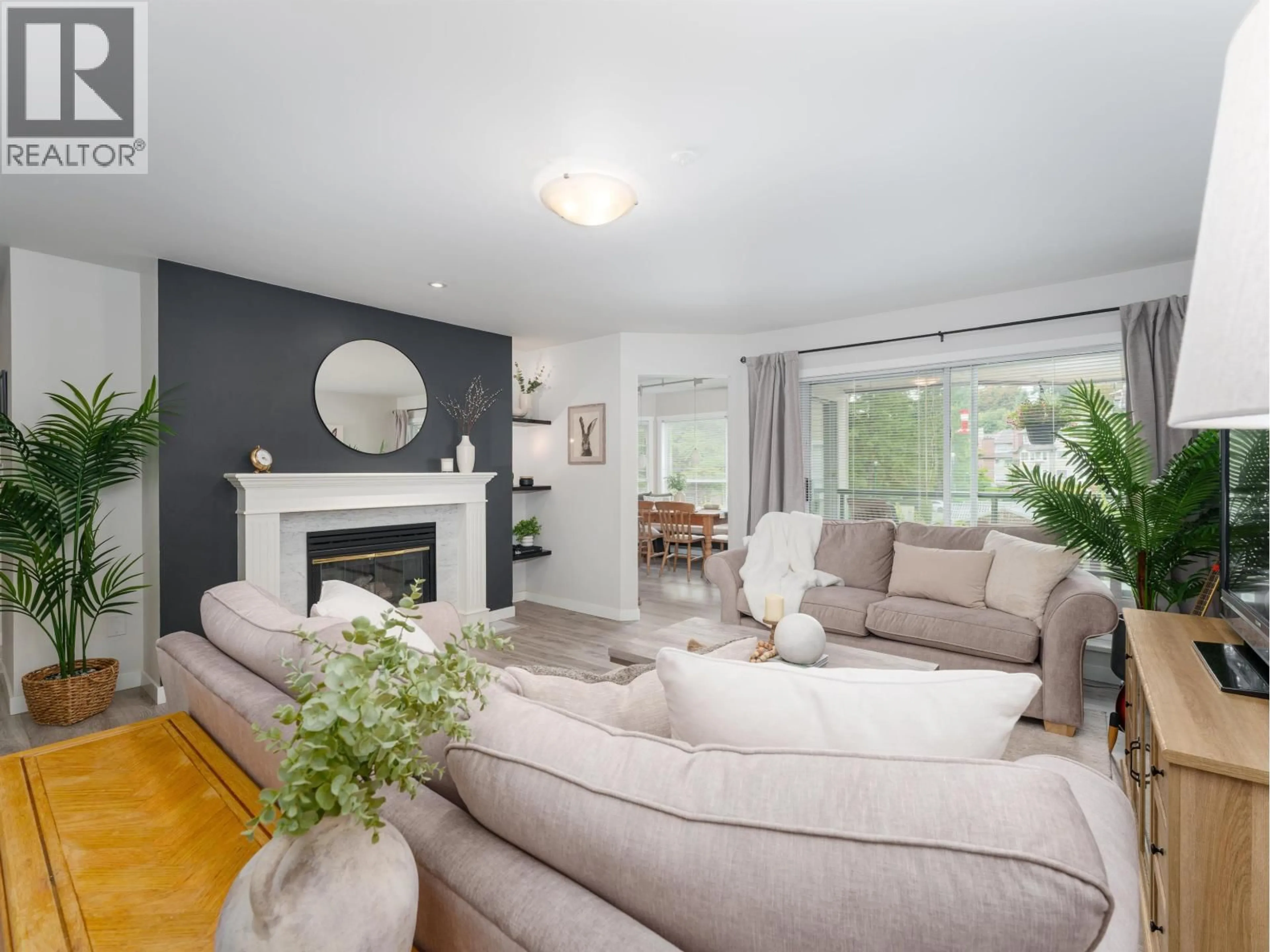 Living room with furniture, unknown for 212 - 3690 BANFF COURT, North Vancouver British Columbia V7H2Y7