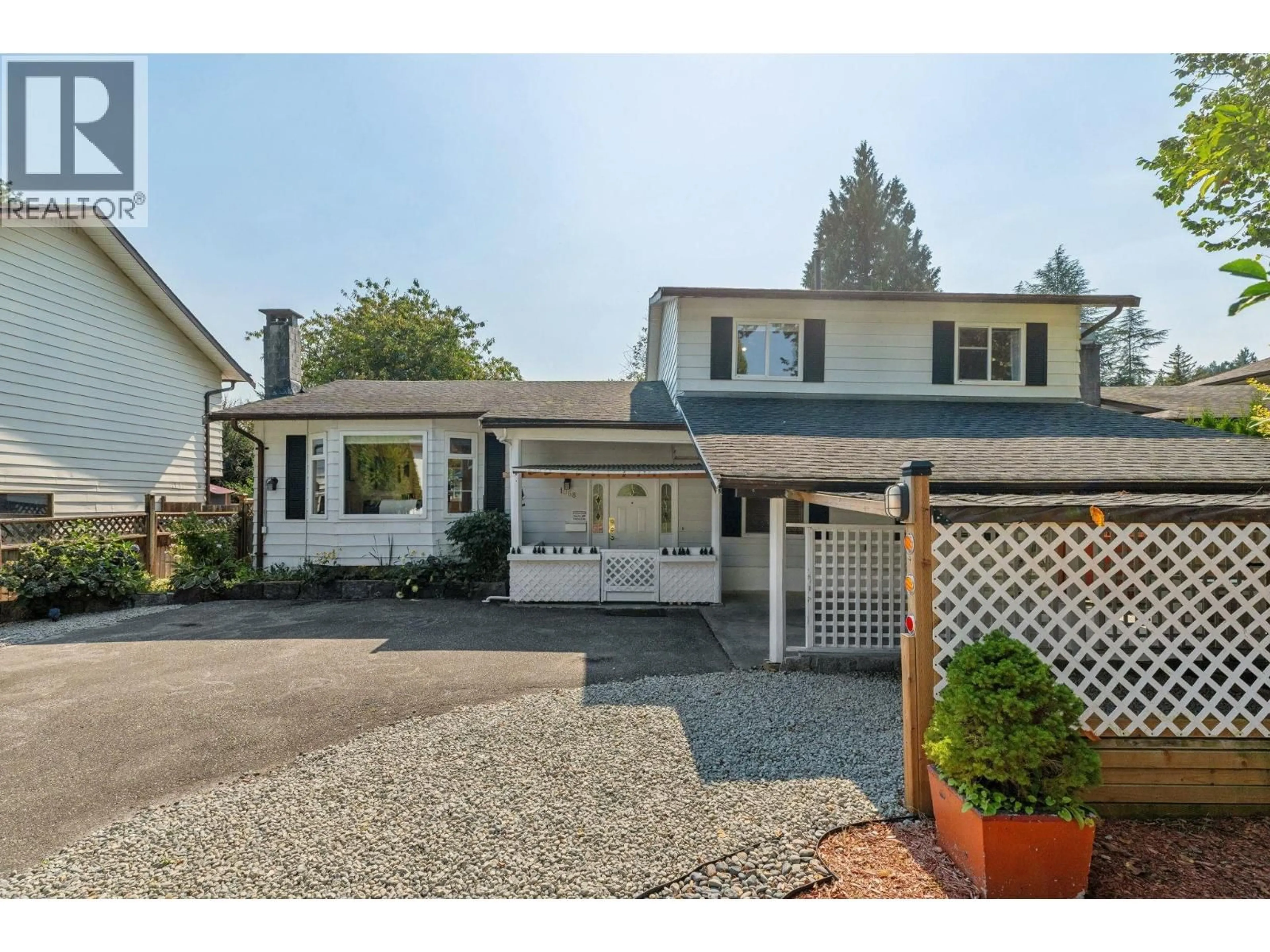Home with vinyl exterior material, street for 1068 SPRUCE AVENUE, Port Coquitlam British Columbia V3B4X6