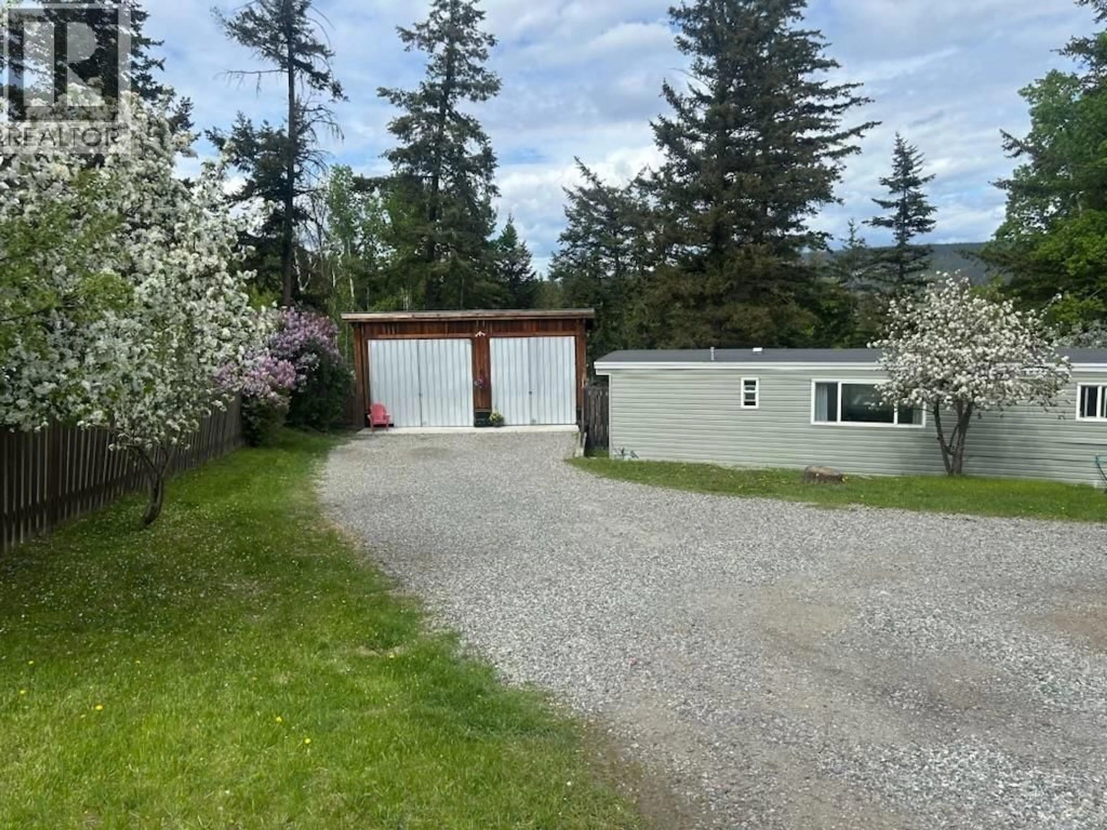 A pic from outside/outdoor area/front of a property/back of a property/a pic from drone, unknown for 542 HODGSON ROAD, Williams Lake British Columbia V2G3P9