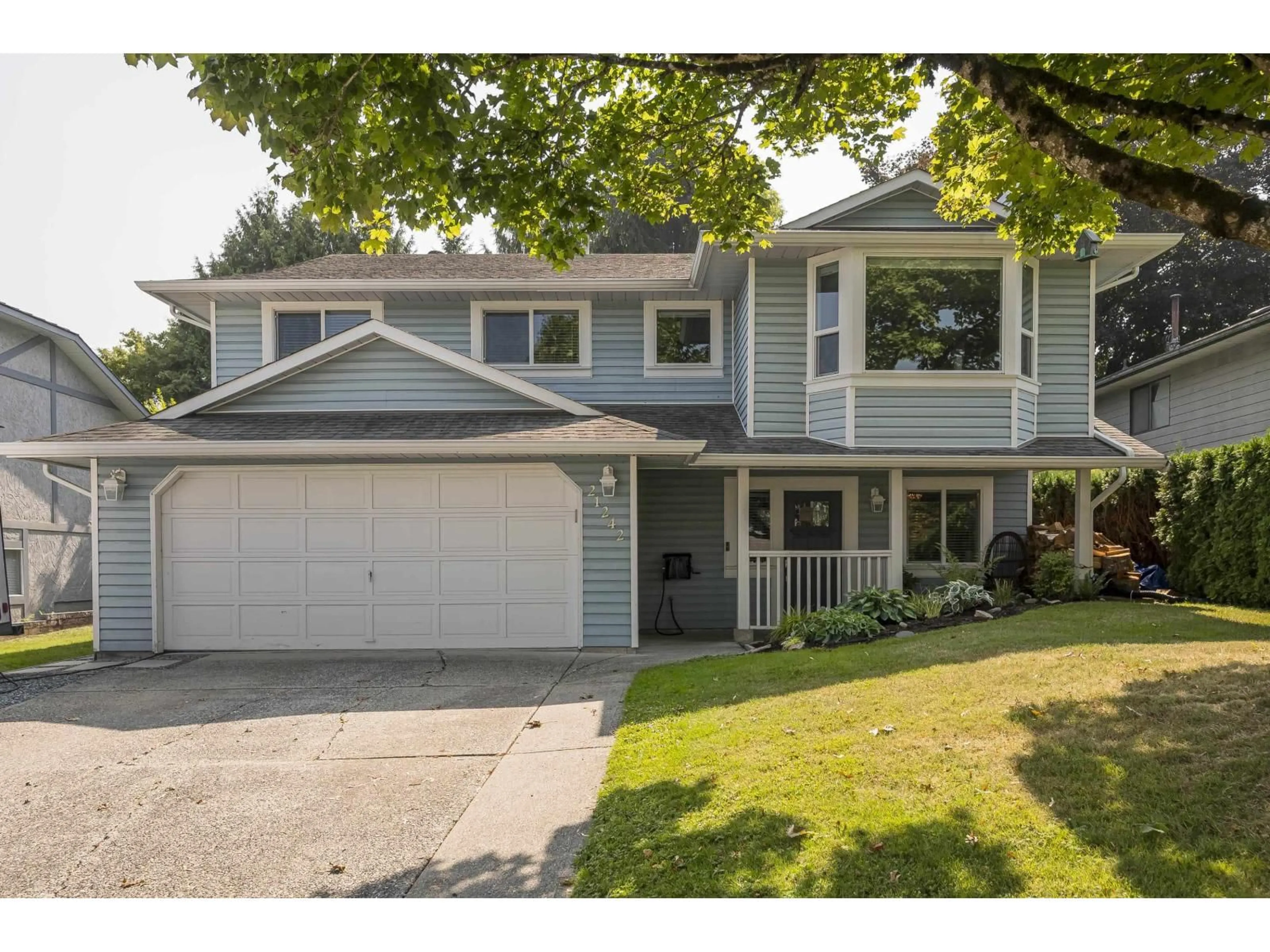 Home with vinyl exterior material, street for 21242 94B, Langley British Columbia V1M1M9