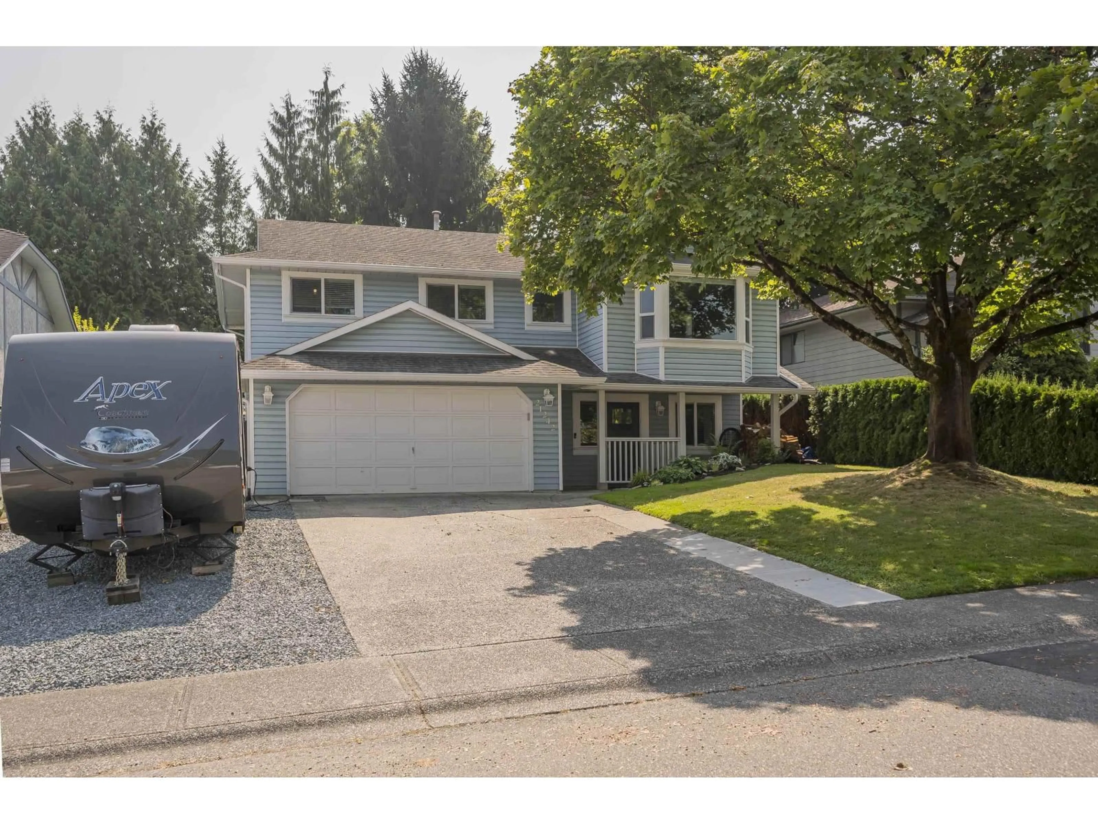 Home with vinyl exterior material, street for 21242 94B, Langley British Columbia V1M1M9
