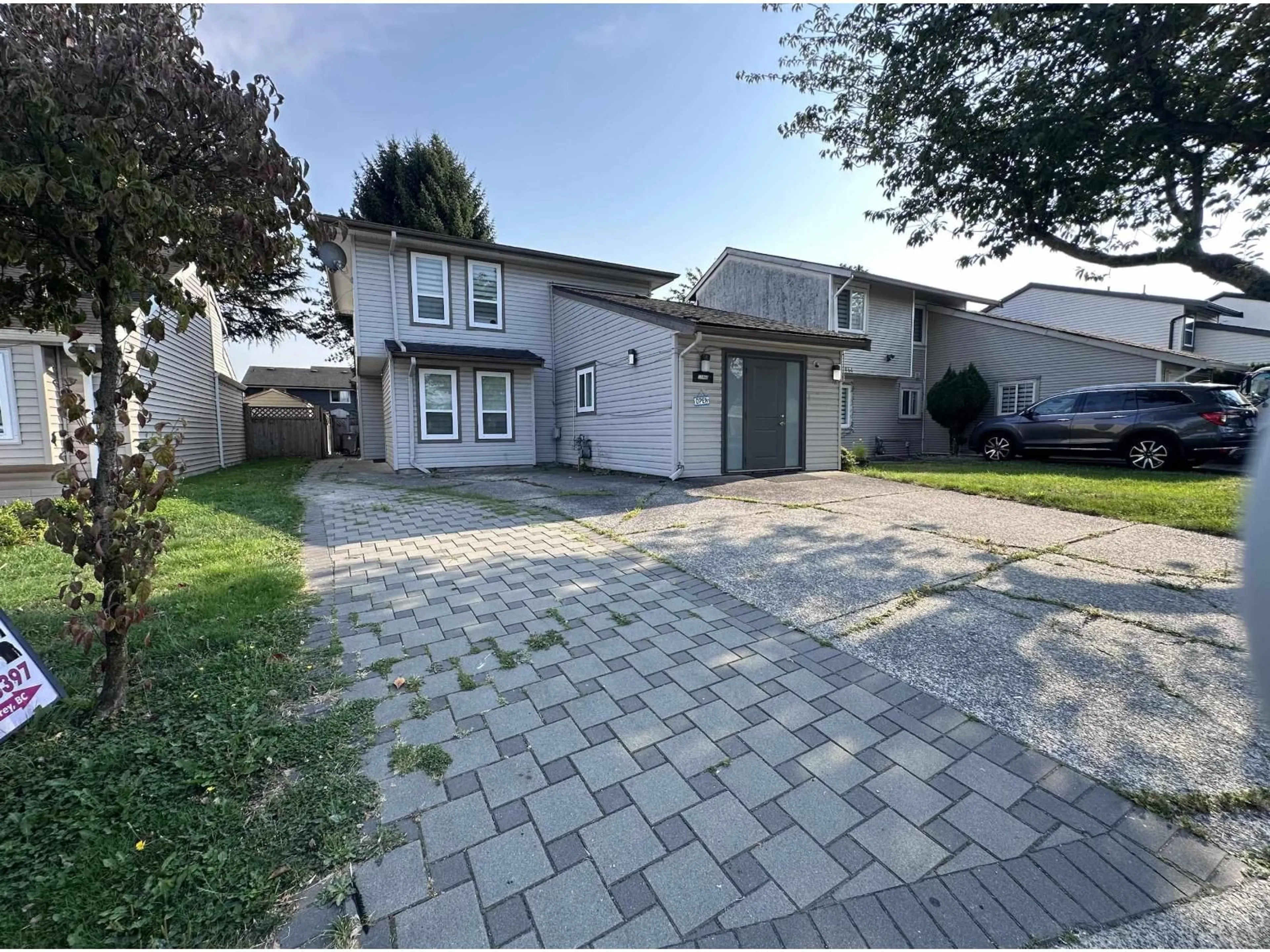 A pic from outside/outdoor area/front of a property/back of a property/a pic from drone, street for 12960 74, Surrey British Columbia V3W7J8