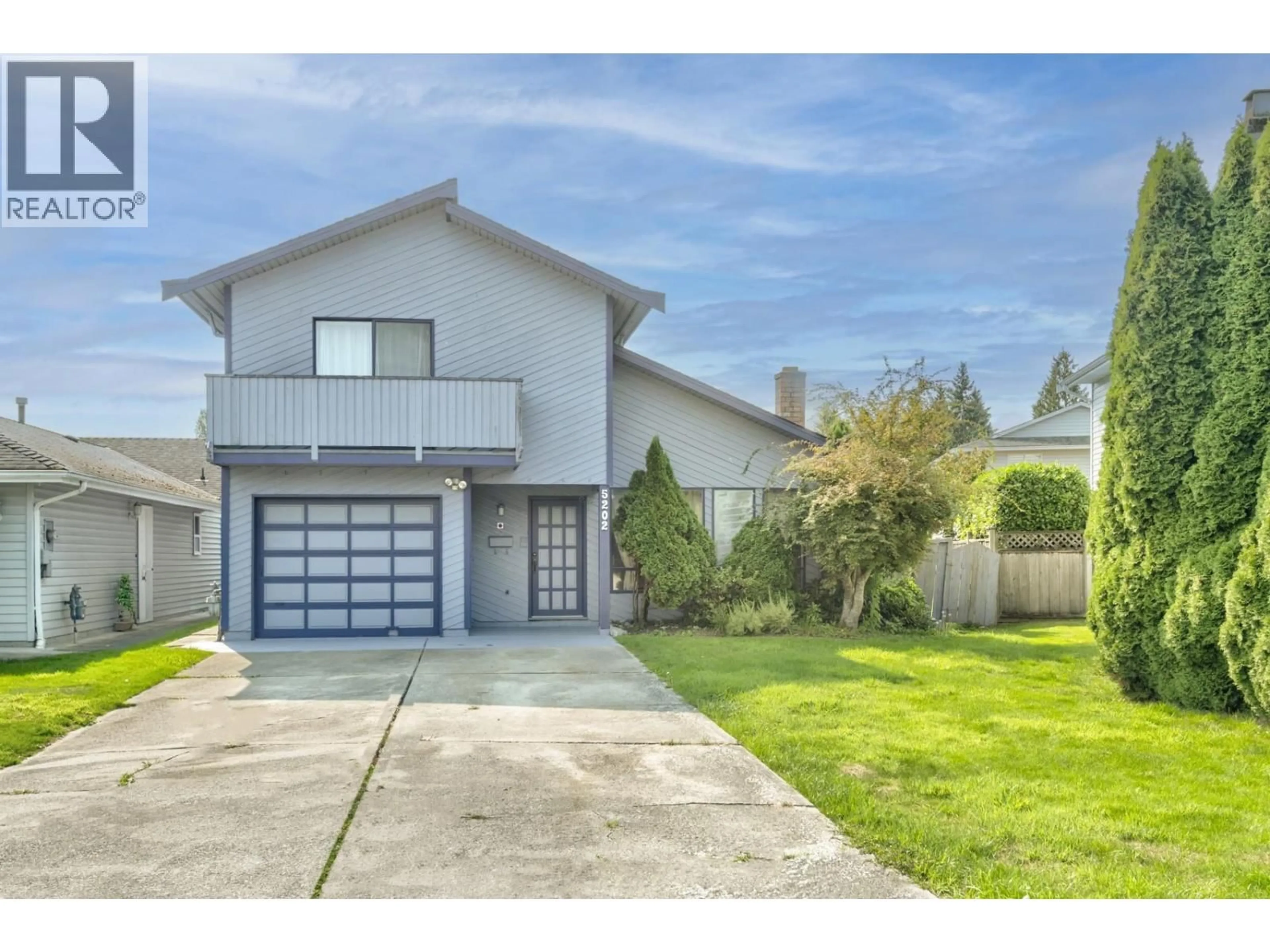 Home with vinyl exterior material, street for 5202 HOLLYWOOD DRIVE, Richmond British Columbia V7E4V4