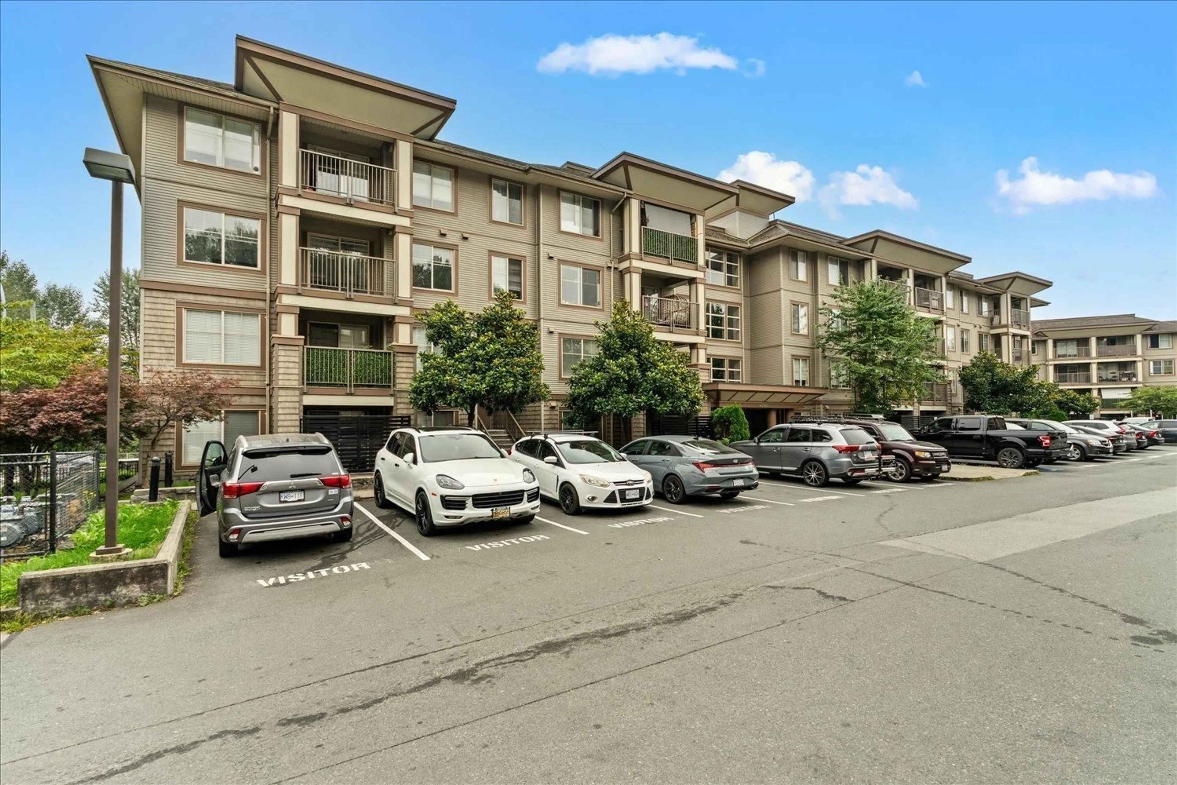 A pic from outside/outdoor area/front of a property/back of a property/a pic from drone, unknown for 302 - 45561 YALE ROAD, Chilliwack British Columbia V2P0A8
