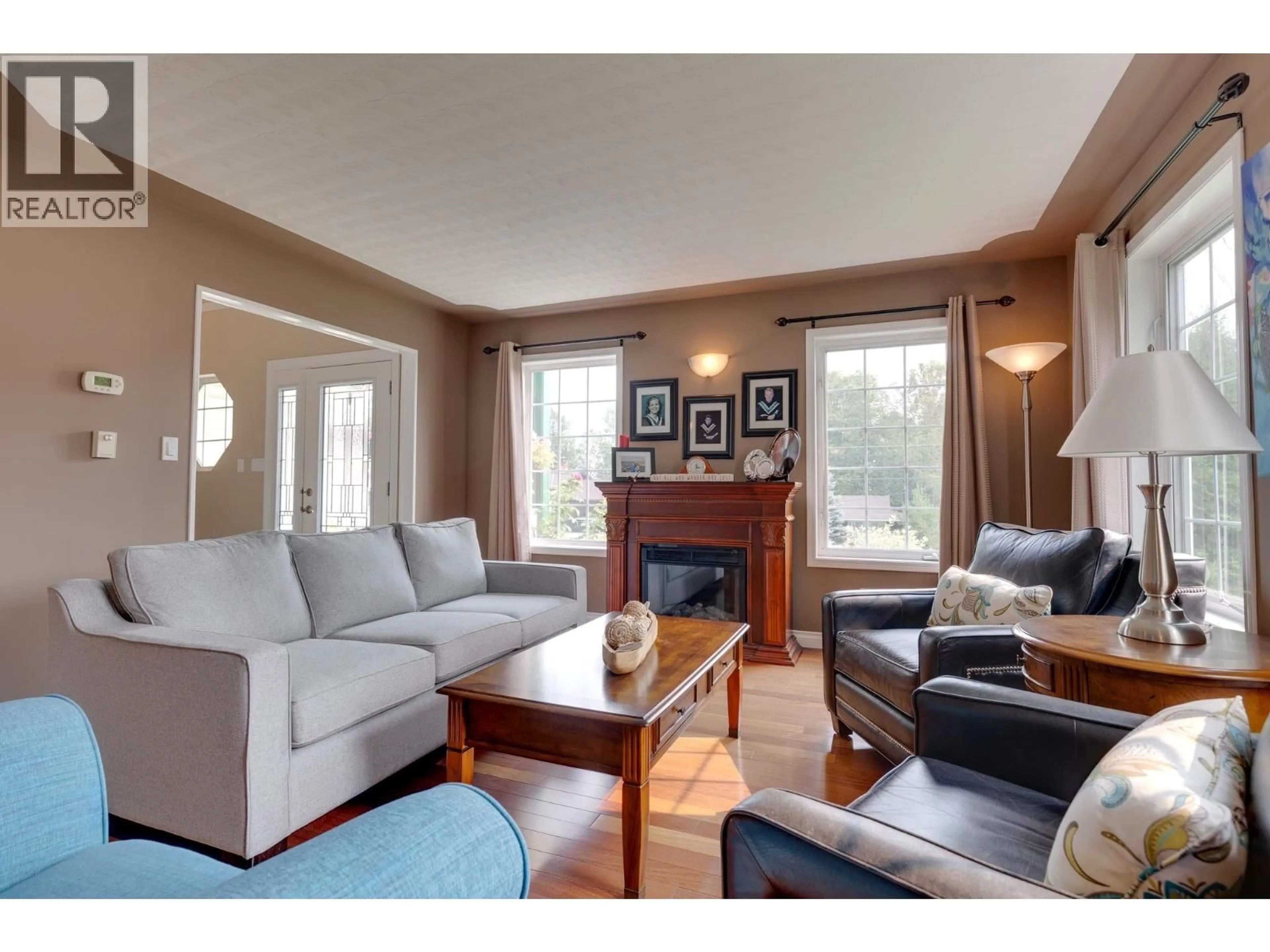 Living room with furniture, wood/laminate floor for 3159 WALLACE CRESCENT, Prince George British Columbia V2K3V5
