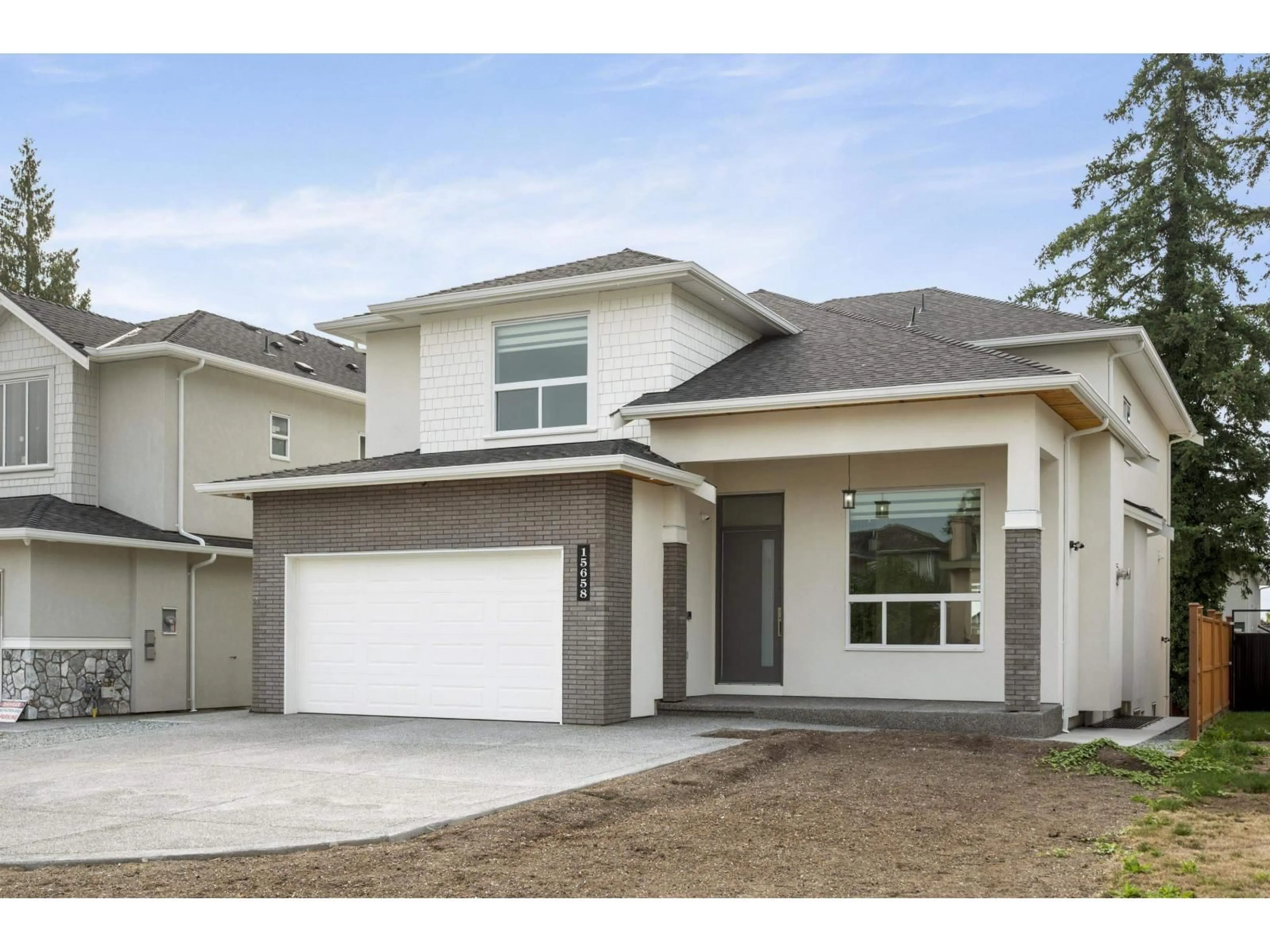Home with vinyl exterior material, street for 15658 82A, Surrey British Columbia V4N0R9