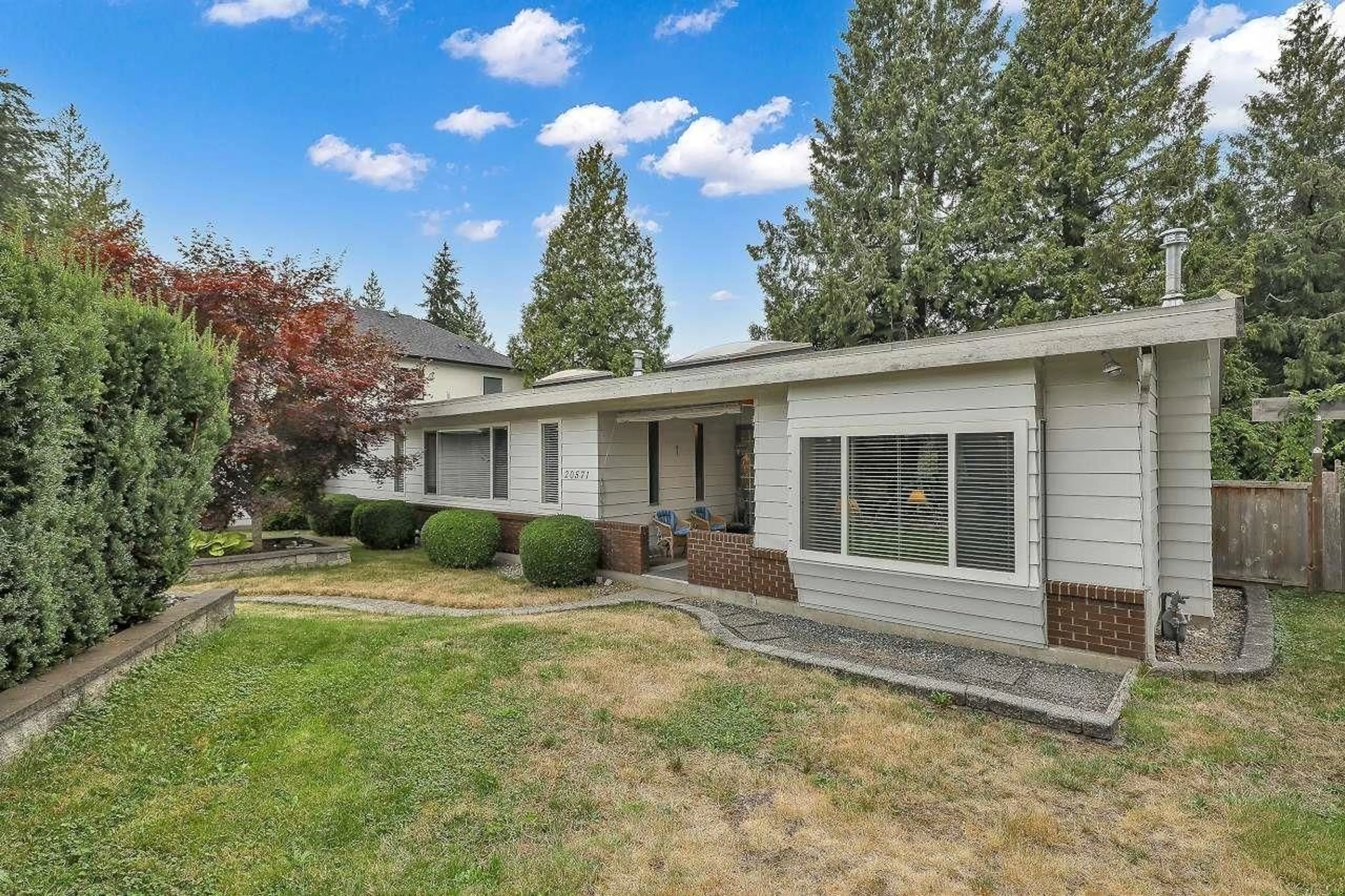 Home with vinyl exterior material, mountain view for 20571 46A, Langley British Columbia V3A3J7