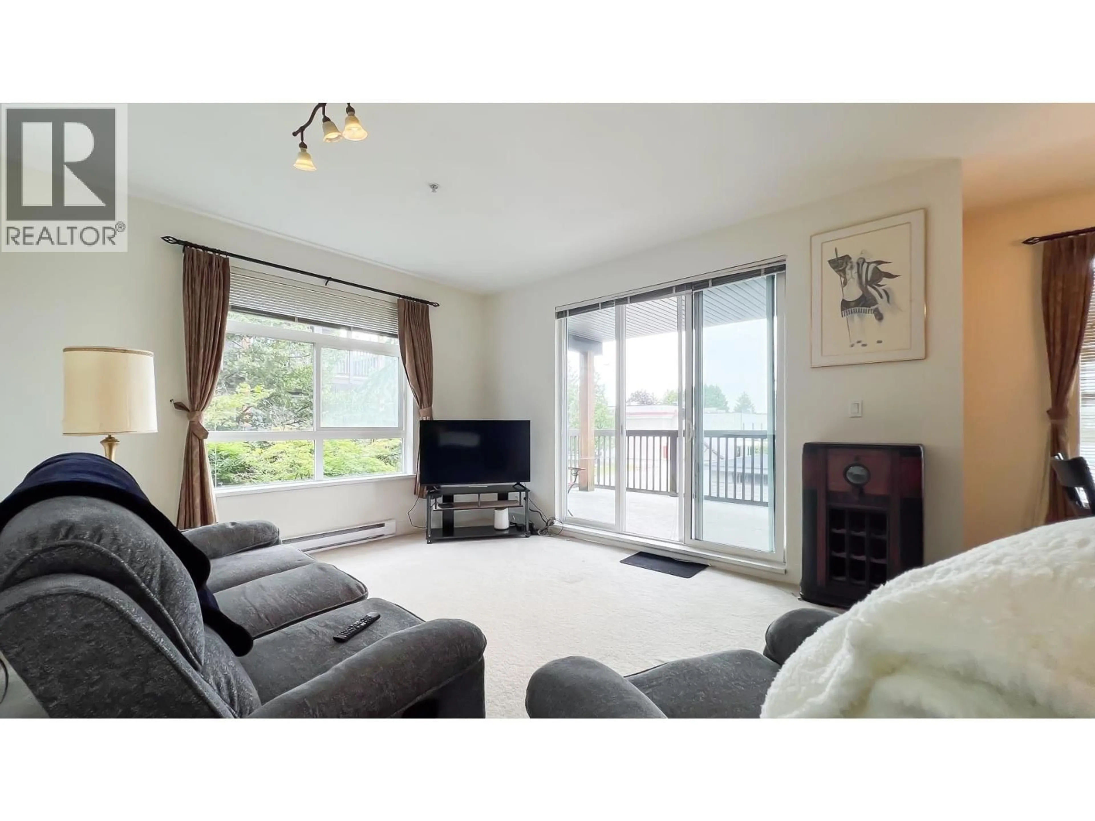 Living room with furniture, wood/laminate floor for 220 - 9233 FERNDALE ROAD, Richmond British Columbia V6Y0B8