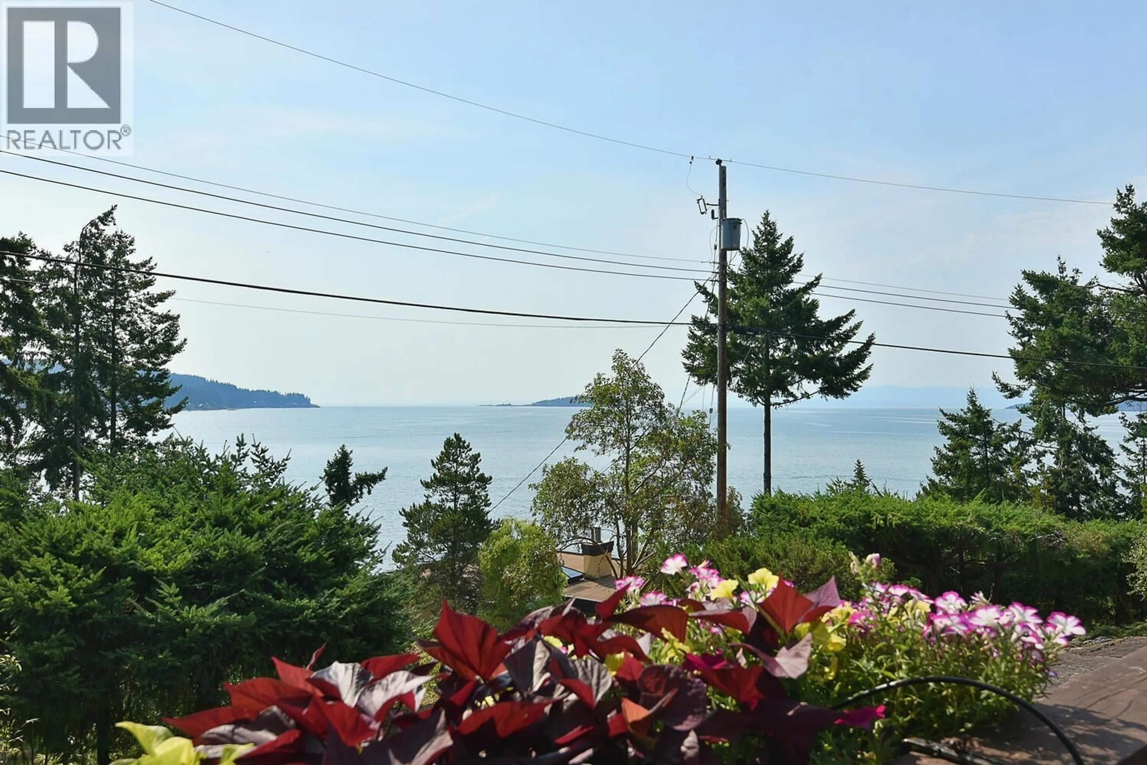 Patio, water/lake/river/ocean view for 9196 TRUMAN ROAD, Halfmoon Bay British Columbia V7Z1B5